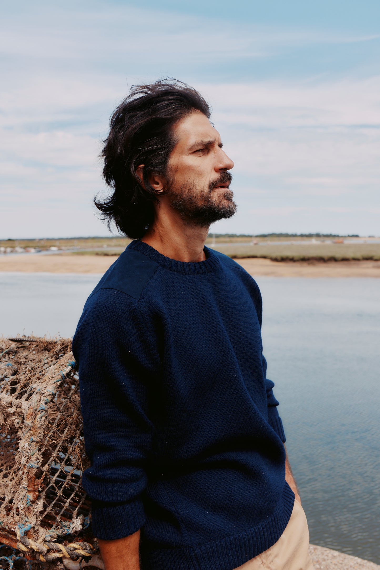 Man in a Bosie Blue Mogganer Navigator Sweater in Navy