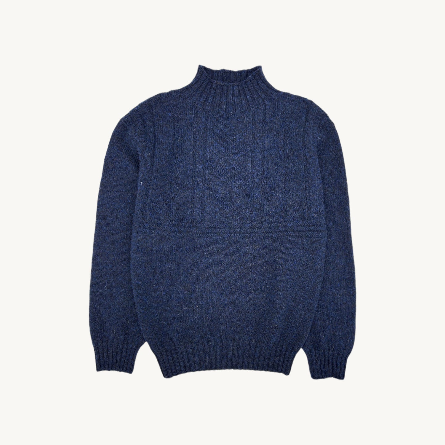 Flatbed Photograph of a Bosie Knitwear Blue Mogganer Ganjey Heritage Heather Knoll Crew Neck Sweater in colour Navy.