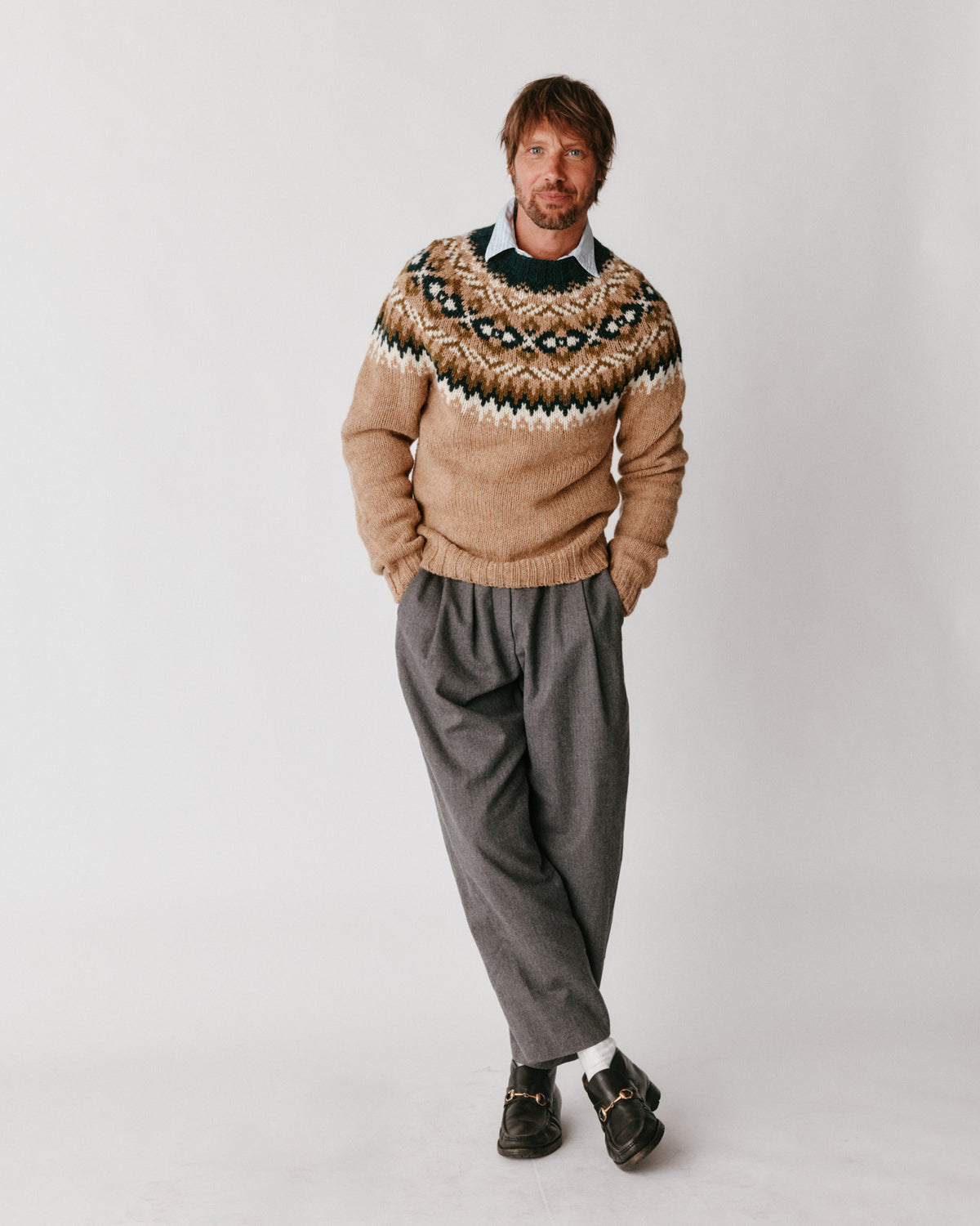 A model wearing a Bosie Blue Mogganer Northeaster Fairisle Yoke Chunky Ecology British Wool in colour Walnut Brown.