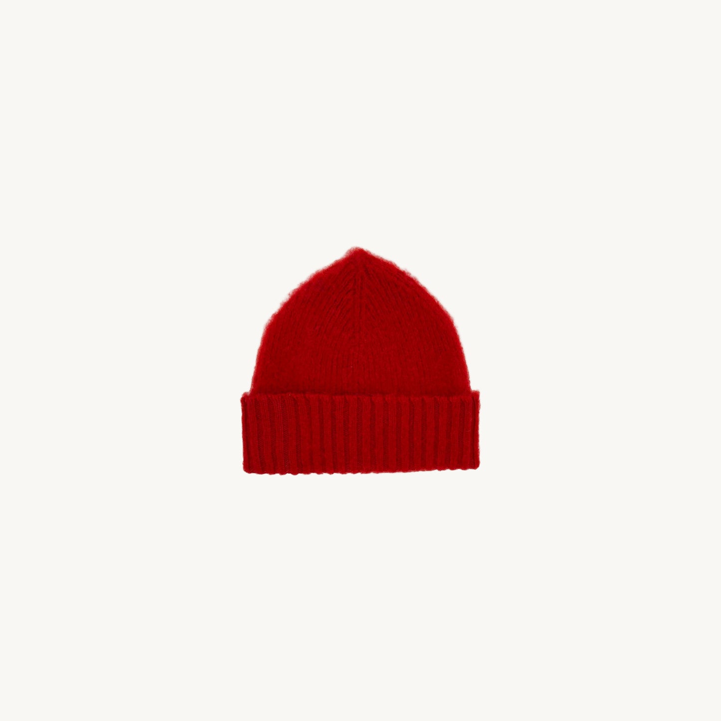 Flat bed photograph of Bosie Brushed Shetland Wool Beanie Hat in the colour French Red.