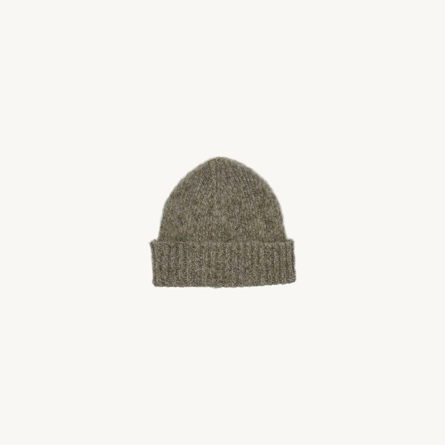 Flat bed photograph of a Bosie Brushed Shetland Wool Beanie Hat in colour Mushroom Brown.