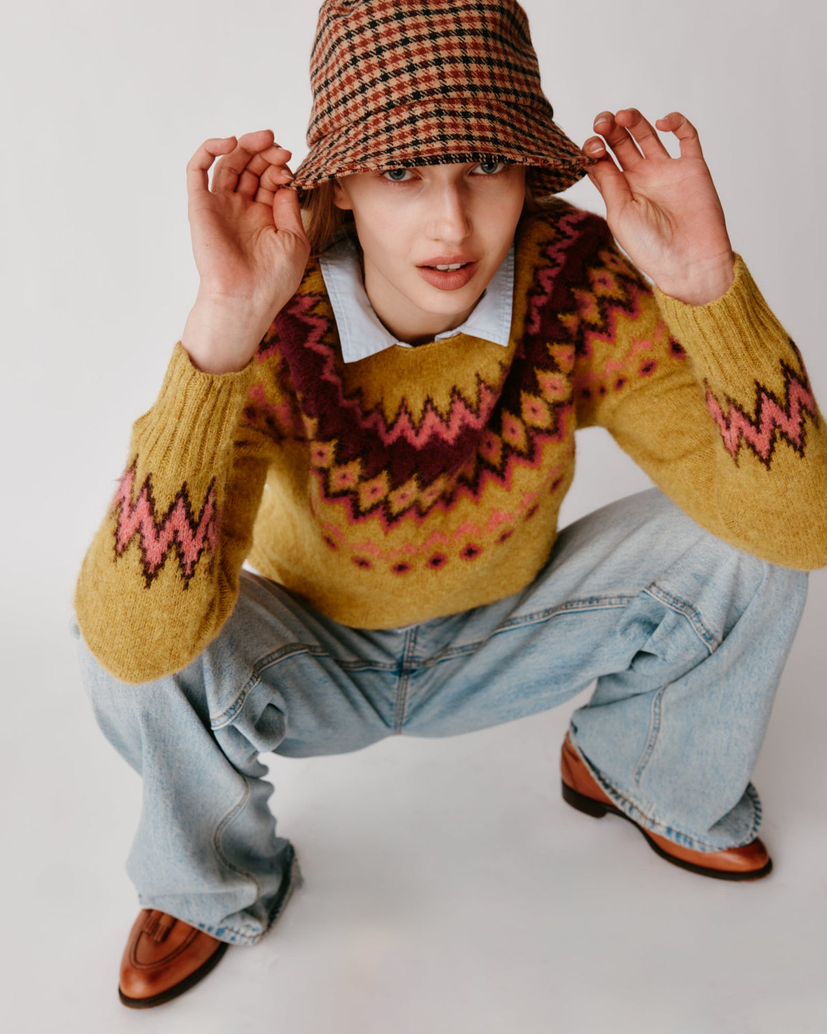 Model wearing the Bosie Fjord Yoke Brushed Fair Isle Women's Lambswool Sweater in Gold Dust / Cummin – seamless, seam-free pure wool, knitted in Scotland by Harley of Scotland for Bosie Knitwear