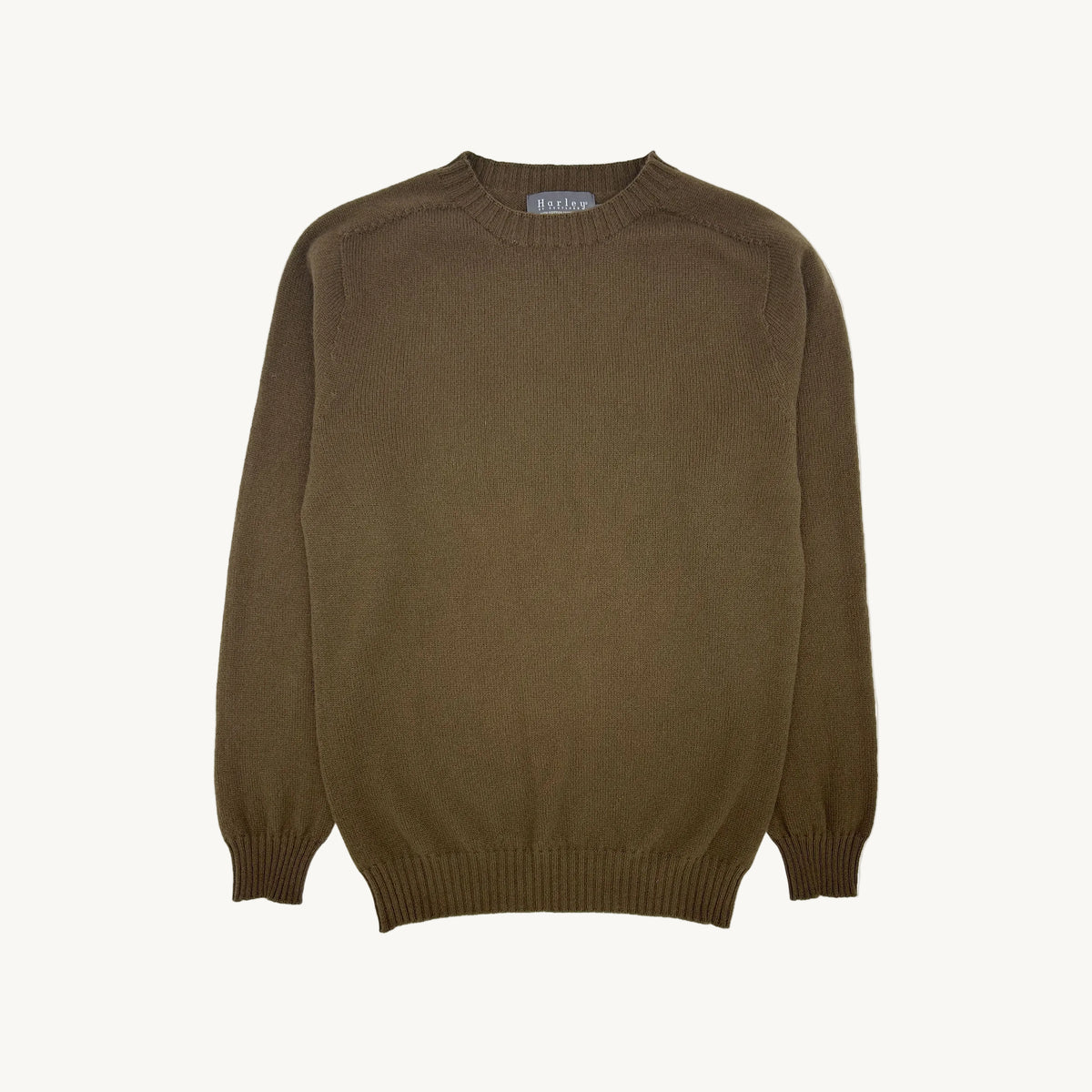 Flatbed photograph of the Bosie Harley of Scotland x Todd and Duncan Pure Men's Cashmere Sweater in Tarp Bronze – seamless, seam-free pure cashmere, knitted in Scotland by Harley of Scotland