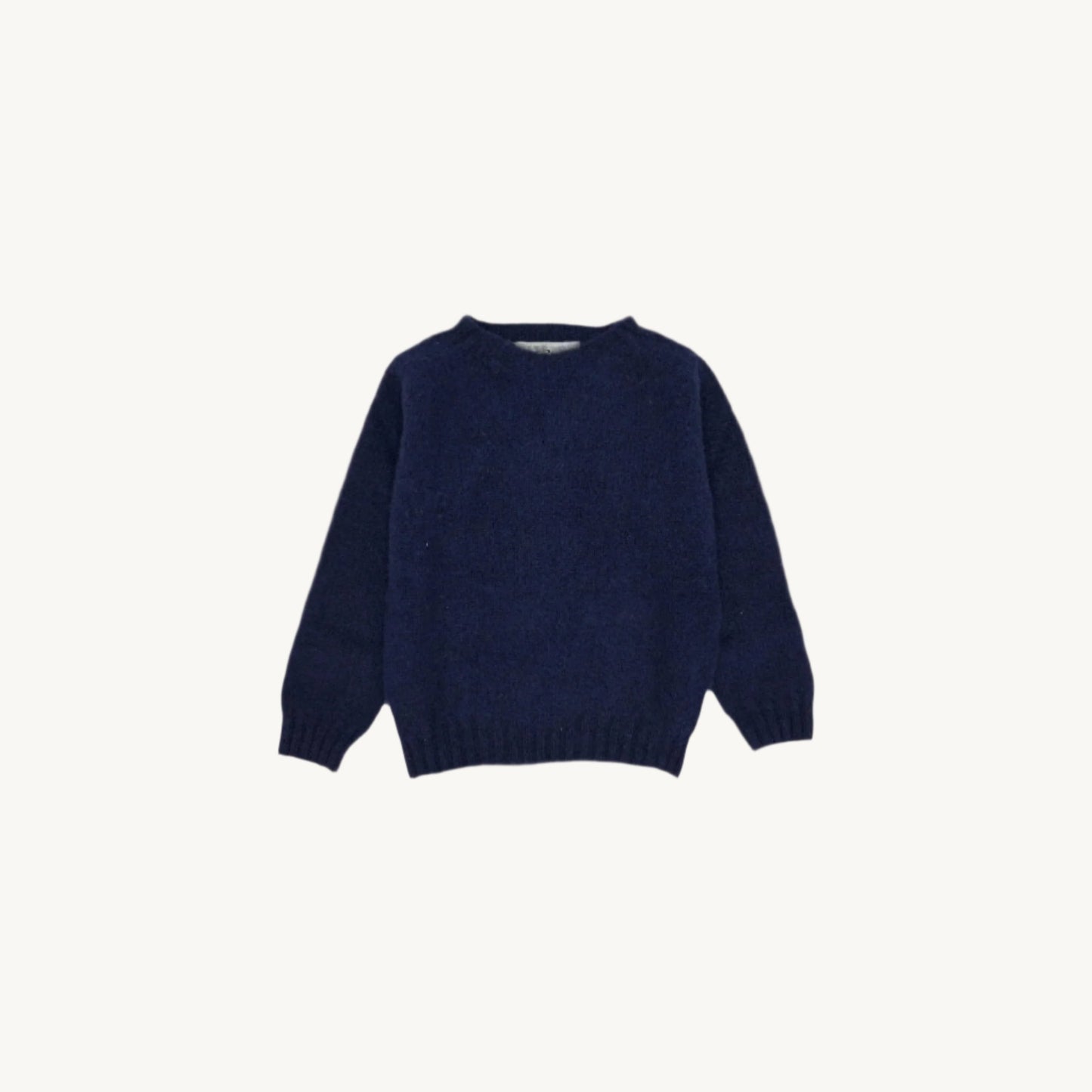 Flatbed Photograph of bosie childrens brushed wool island Shetland sweater jumper in navy