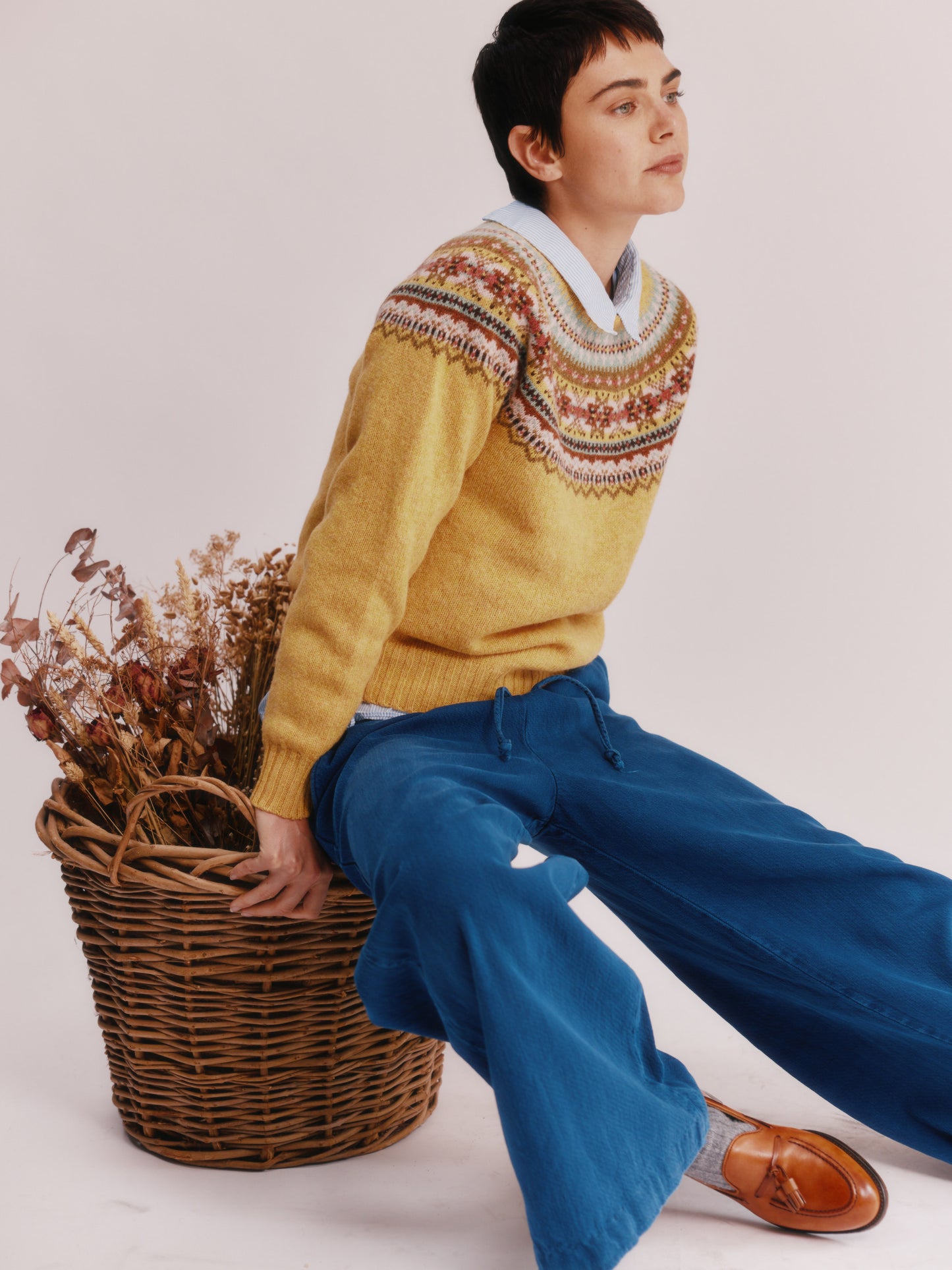 Women wearing a Bosie Knitwear Sorcha Yoke Fair Isle Women's Sweater in colour Marzipan Yellow.