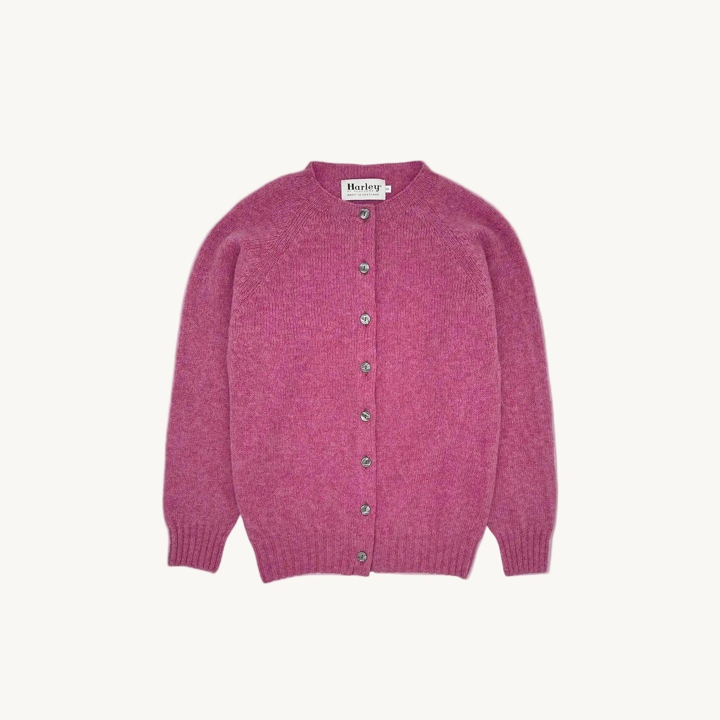 Flatbed image of Bosie Shetland Cardigan in Blush Pink