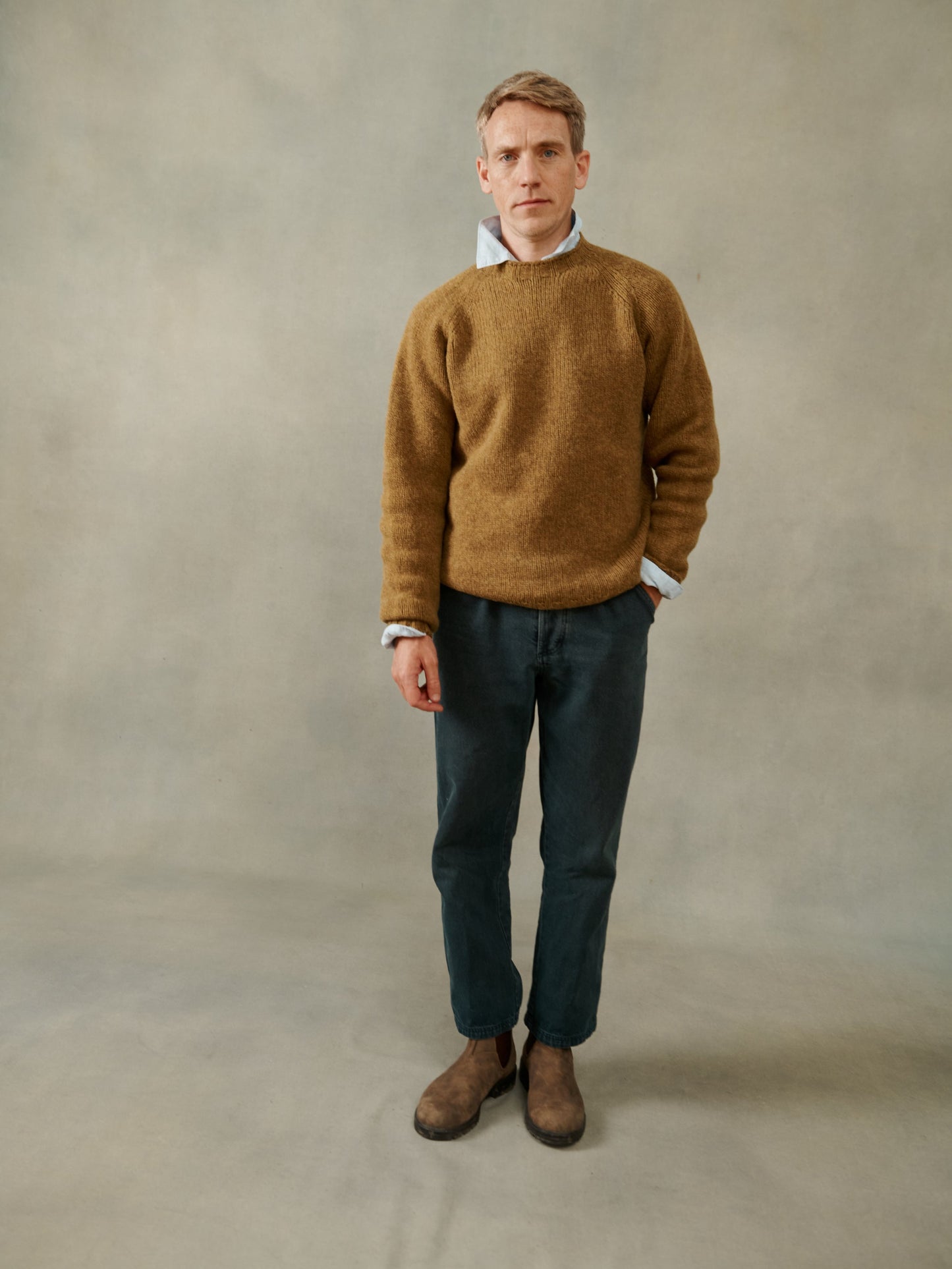 Man wearing a Blue Mogganer North Sea Chunky Seamless Supersoft Shetland in asparagus brown by Bosie Knitwear