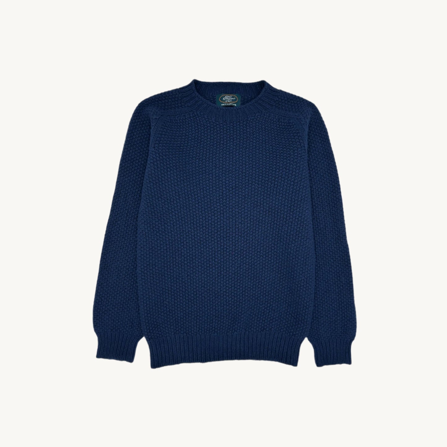 Flatbed Photograph of a Blue Mogganer American Navy Maritime Moss Stitch Chunky Geelong Sweater by Bosie Knitwear