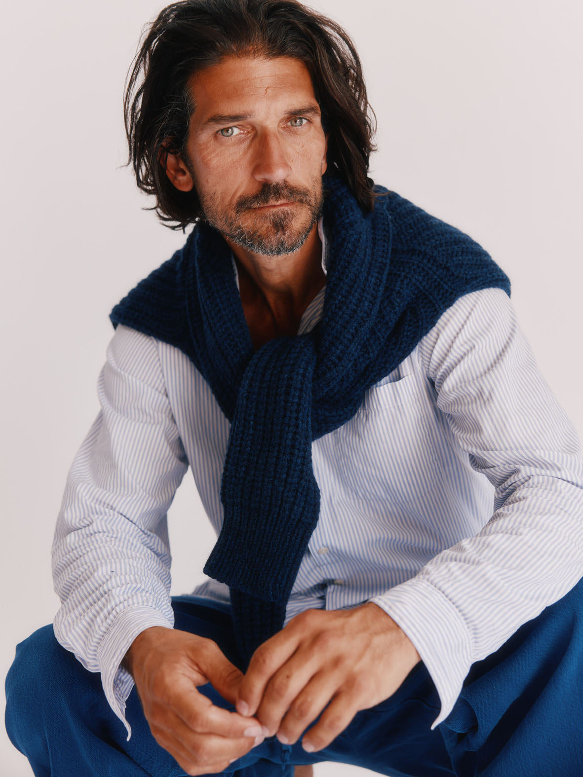 Man wearing Blue Mogganer Fishermans Chunky Geelong Superfine Lambswool Ribbed Sweater in Cosmos Navy by Bosie Knitwear.