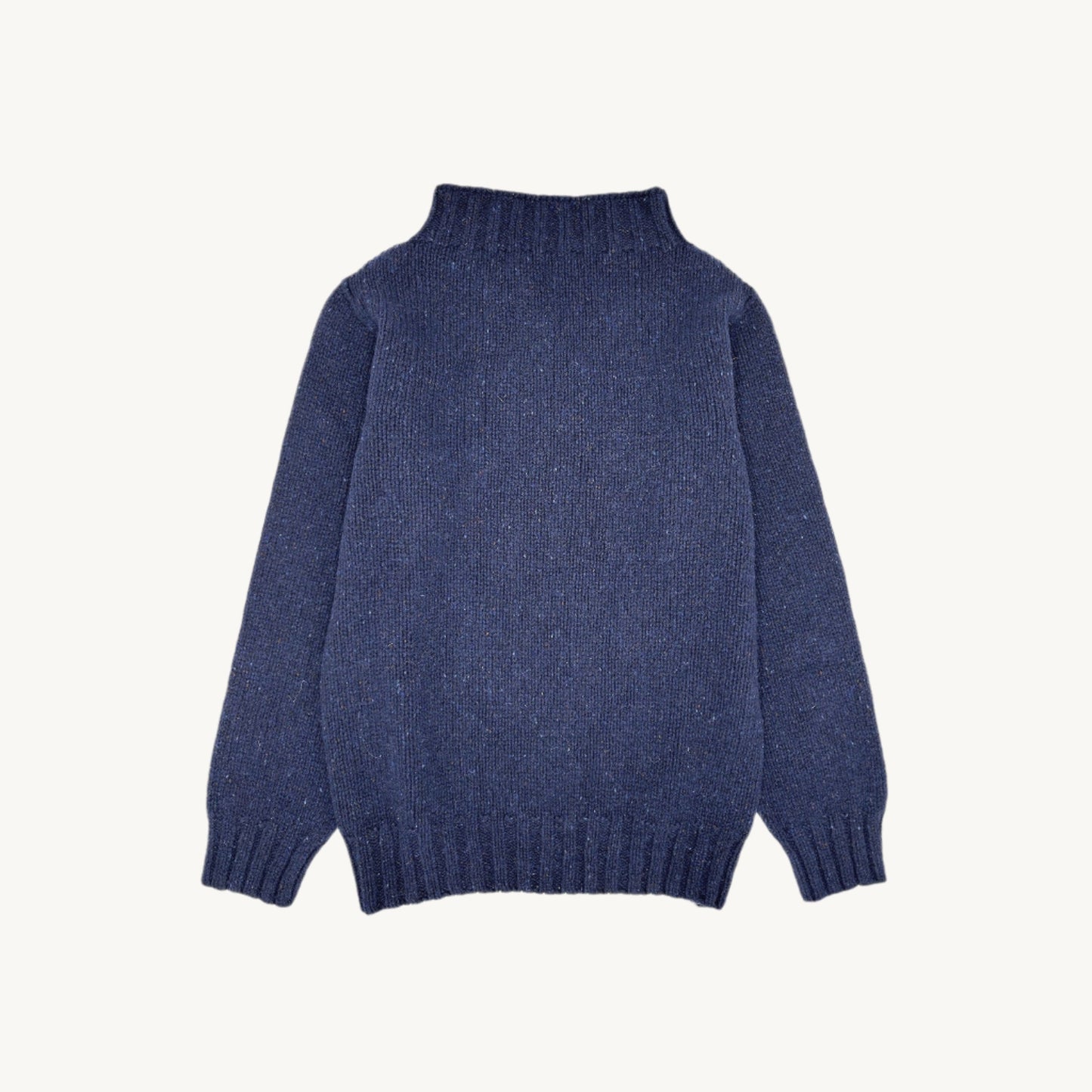 Flatbed Photograph of a Blue Mogganer Lighthouse Chunky Glenugie Nep Sweater in Jura Navy by Bosie Knitwear