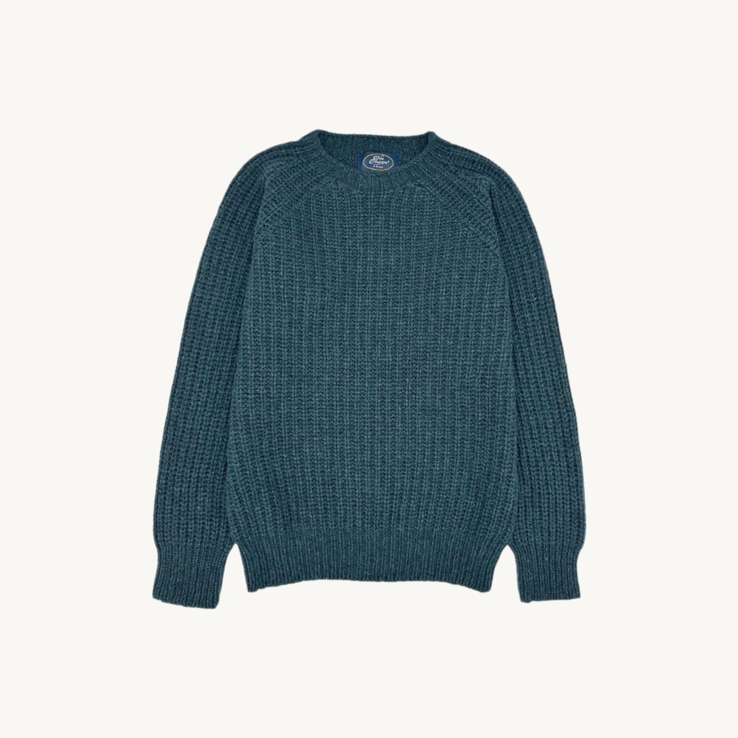 Flatbed Photograph of a Blue Mogganer Fisherman Ribbed Raglan Chunky Geelong Sweater in Lugano Teal by Bosie Knitwear