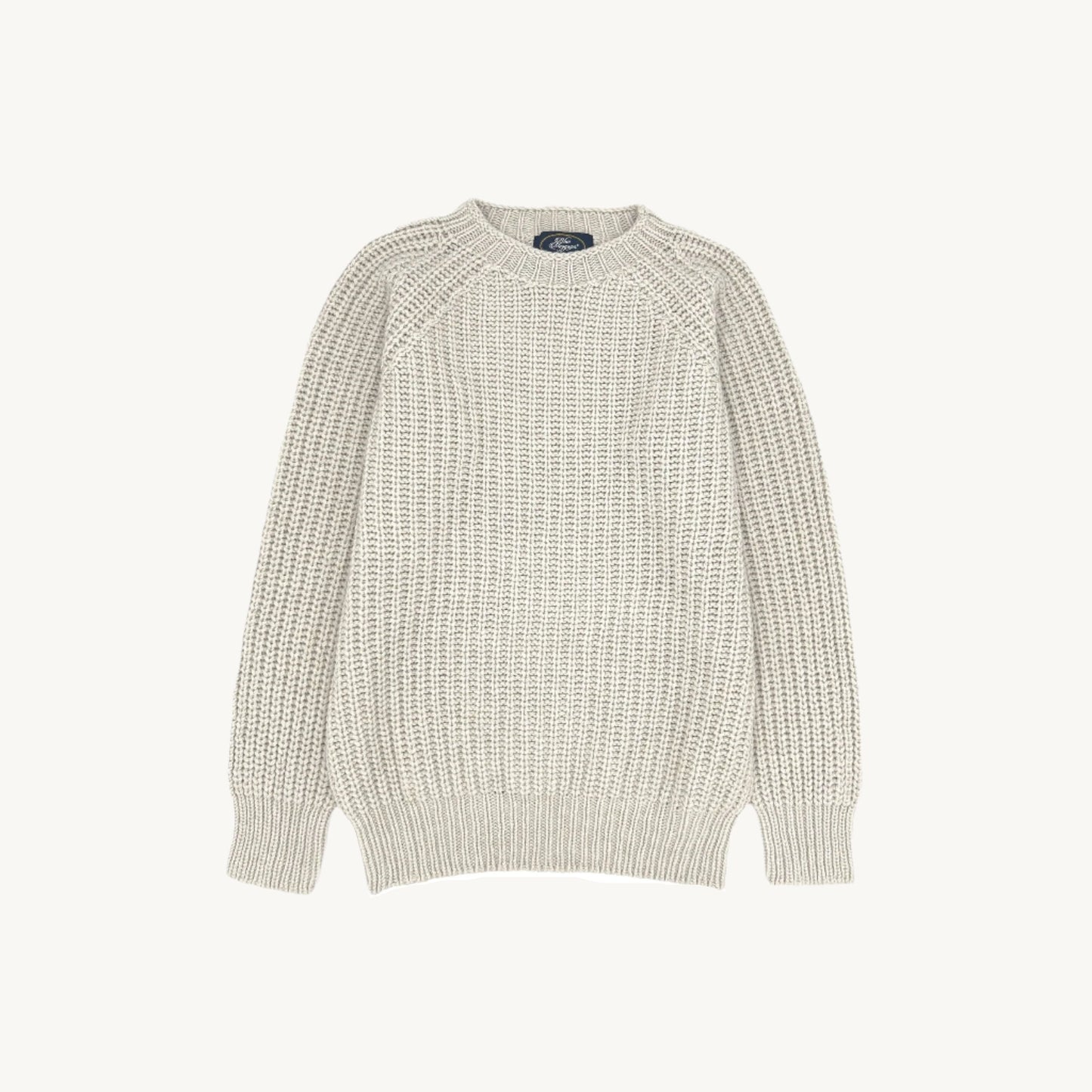Flatbed Photograph of a Blue Mogganer Fisherman Ribbed Raglan Chunky Geelong Sweater in Swansdown Natural by Bosie Knitwear