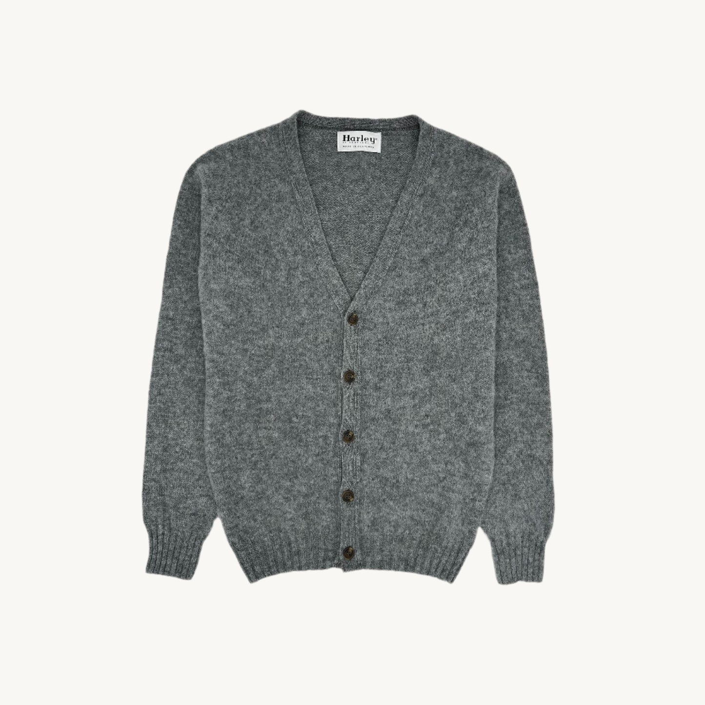 Man wearing a Bosie Knitwear Harley of Scotland seamless saddle shoulder men's Shaggy Brushed Shetland Cardigan in Silver Grey