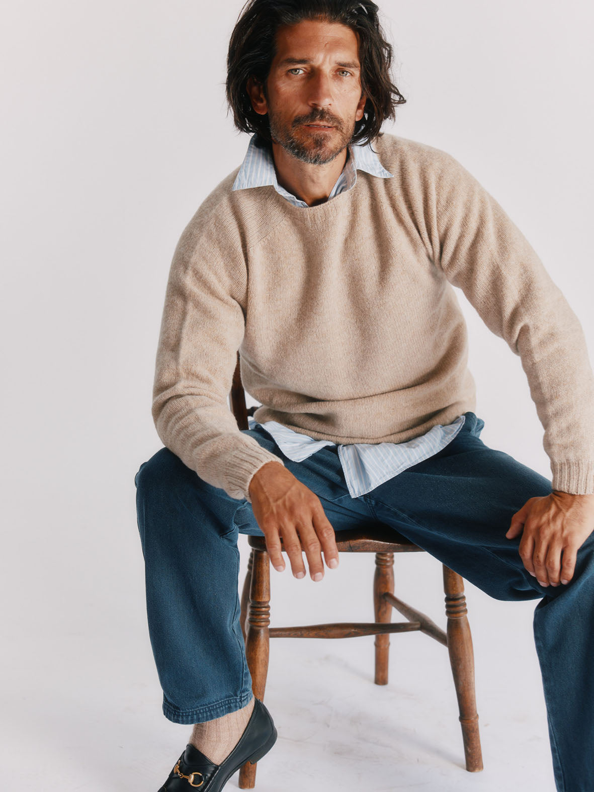 Man wearing a Bosie Knitwear Harley of Scotland seamless saddle shoulder men's Shetland sweater jumper in Oatmilk Beige