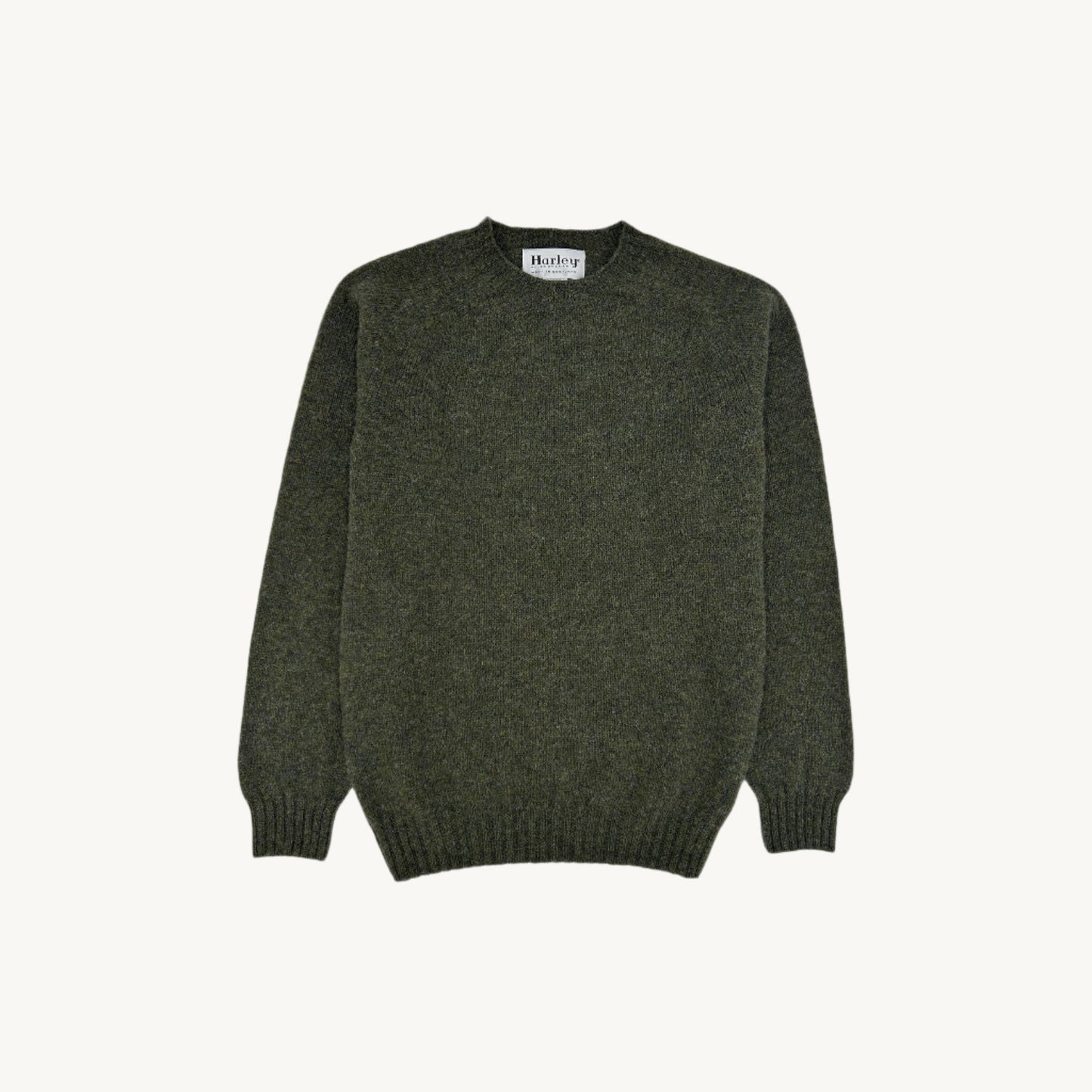 Flatbed Photograph of a Bosie Knitwear Harley of Scotland seamless saddle shoulder men's Shetland sweater jumper in Pineshadow GreenScotland Shetland