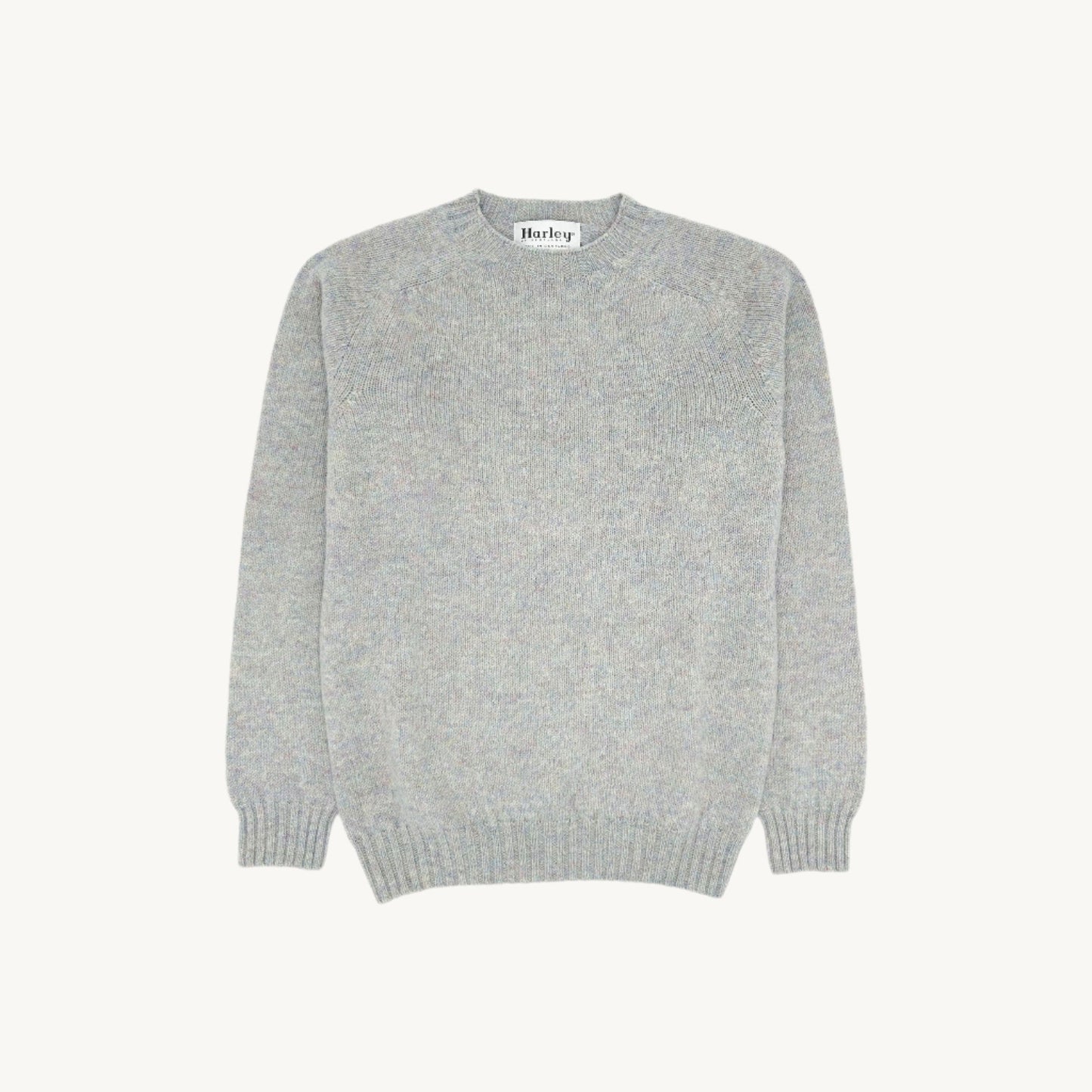 Flatbed Photograph of a Bosie Knitwear Harley of Scotland seamless saddle shoulder men's Shetland sweater jumper in Ugie Pearl