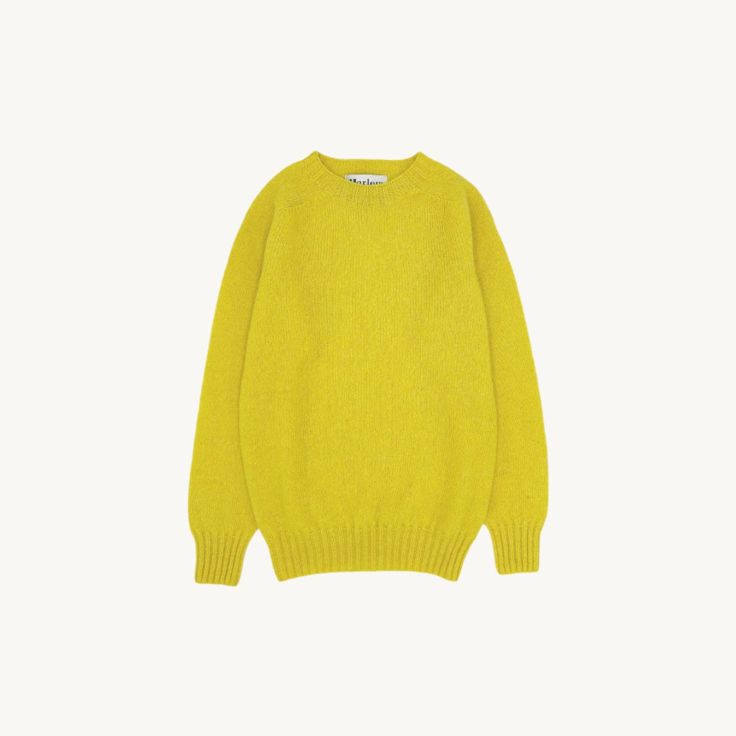 Flatbed Photograph of a Bosie Knitwear Harley of Scotland seamless saddle shoulder women's Shetland sweater jumper in Lemon Zest Orange