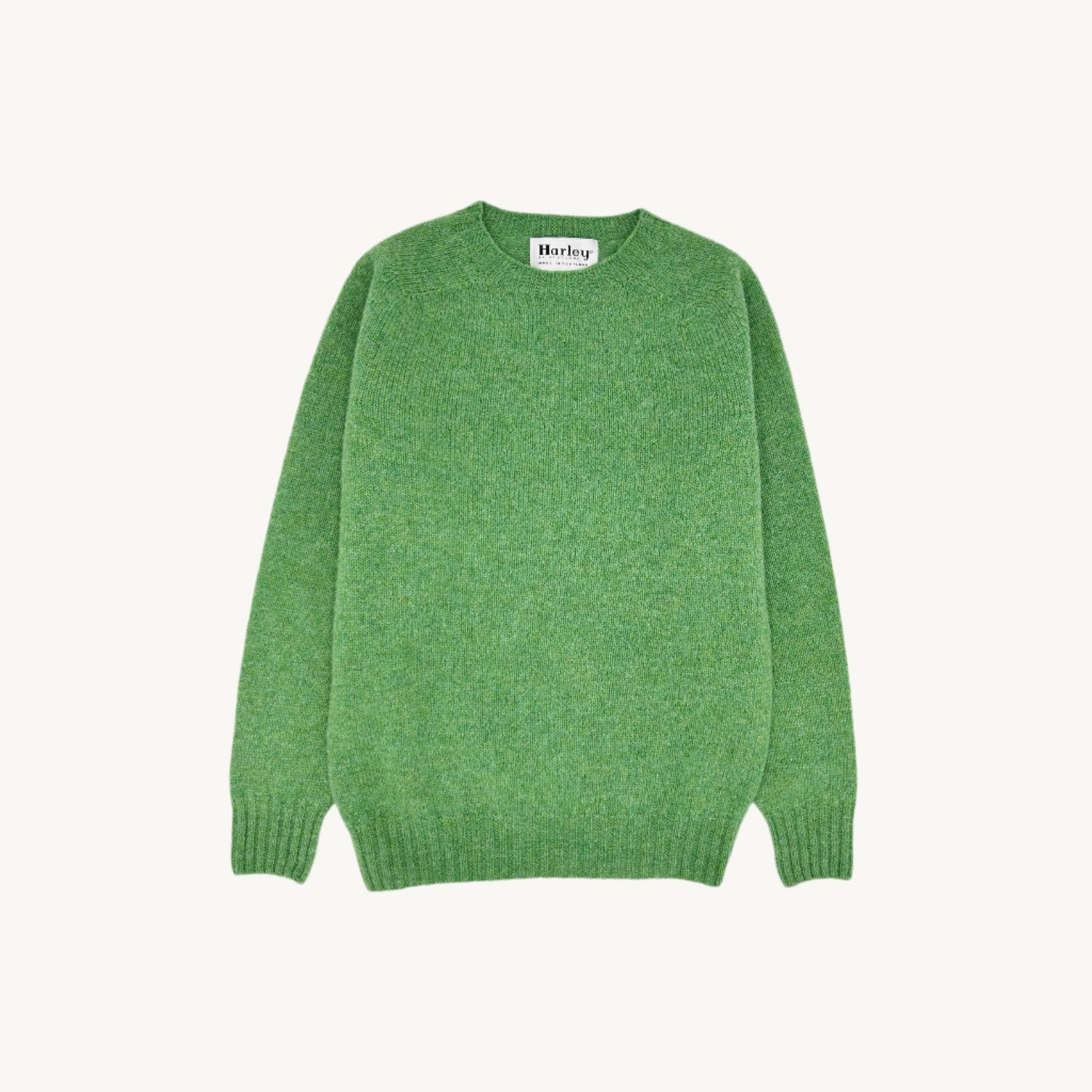 Flatbed Photograph of a Bosie Knitwear Harley of Scotland seamless saddle shoulder women's Shetland sweater jumper in Mint Green