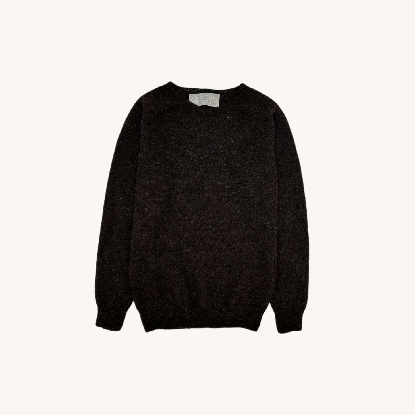 Flatbed Photograph of a Bosie Knitwear Harley of Scotland undyed seamless saddle shoulder men's Everest 1 ply Voe True Shetland sweater jumper in Warm Black