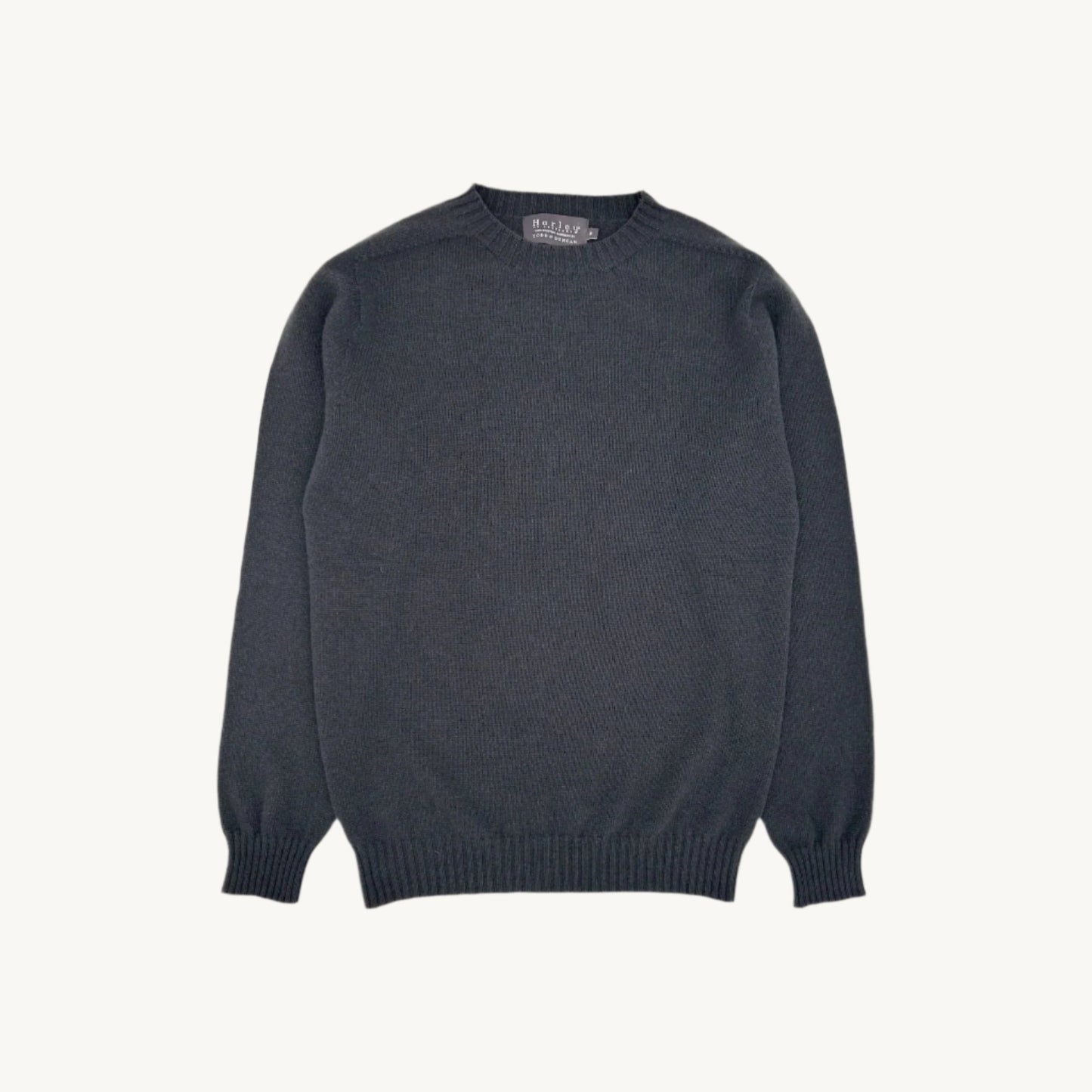 Flatbed photograph of a Harley Todd and Duncan Cashmere Sweater in Darkest Teal