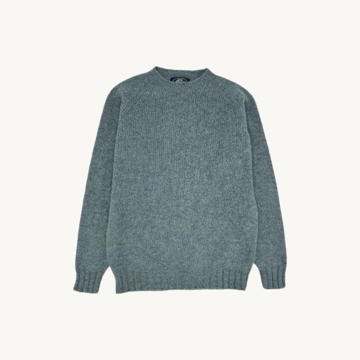 Flatbed Photograph of a Blue Mogganer North Sea Chunky Seamless Supersoft Shetland in graphite green by Bosie Knitwear