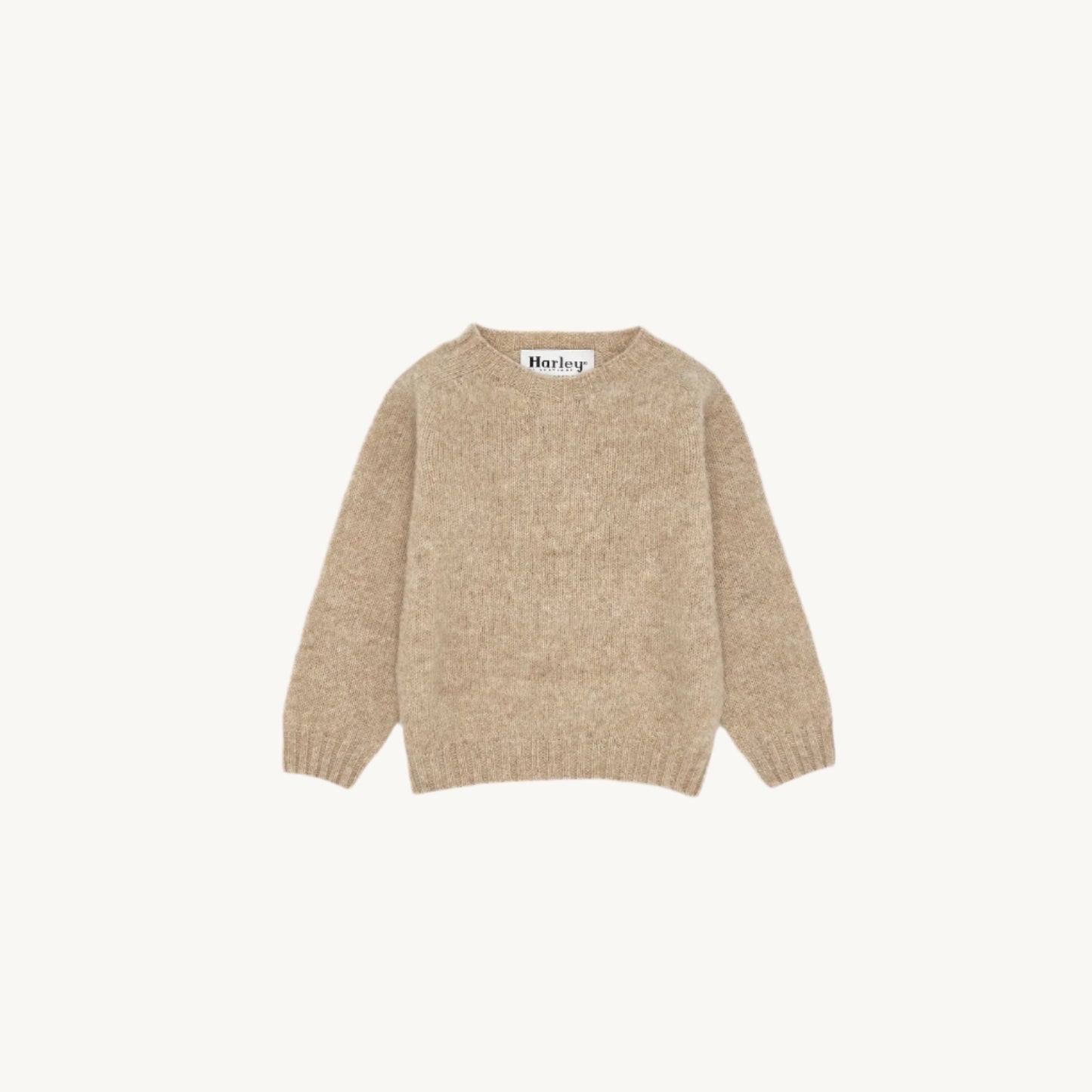 Flatbed Photograph of childrens brushed wool island Shetland sweater jumper in Tusk Oatmeal