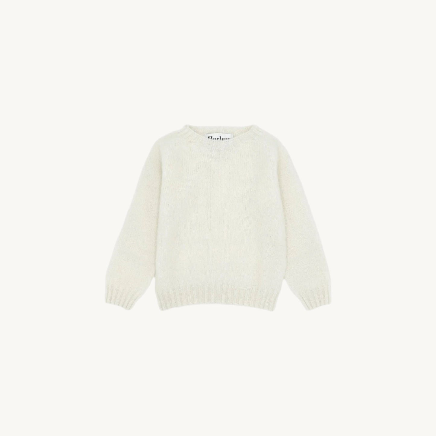Flatbed Photograph of childrens brushed wool island Shetland sweater jumper in white/ecru