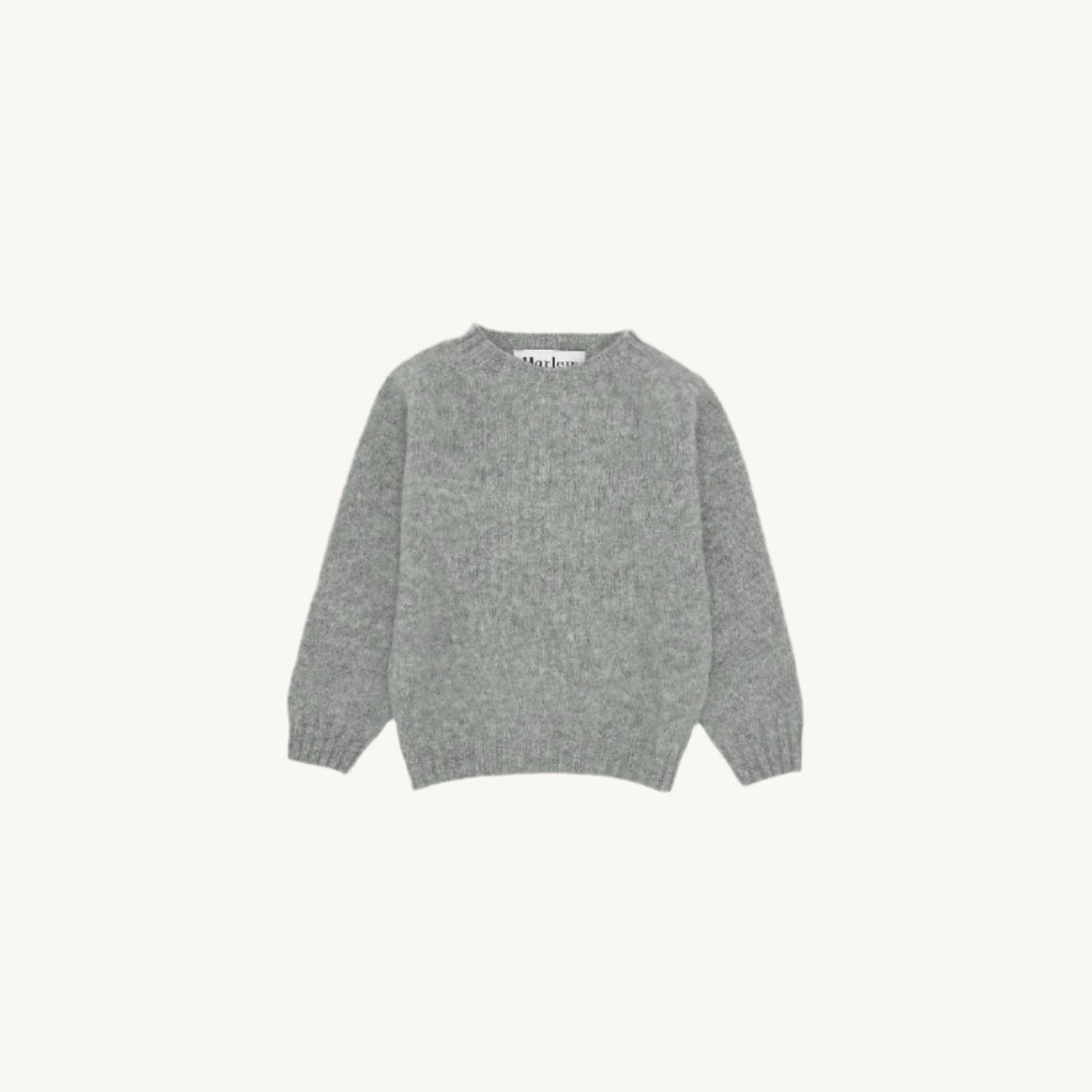 Flatbed Photograph of childrens brushed wool island Shetland sweater jumper in silver grey