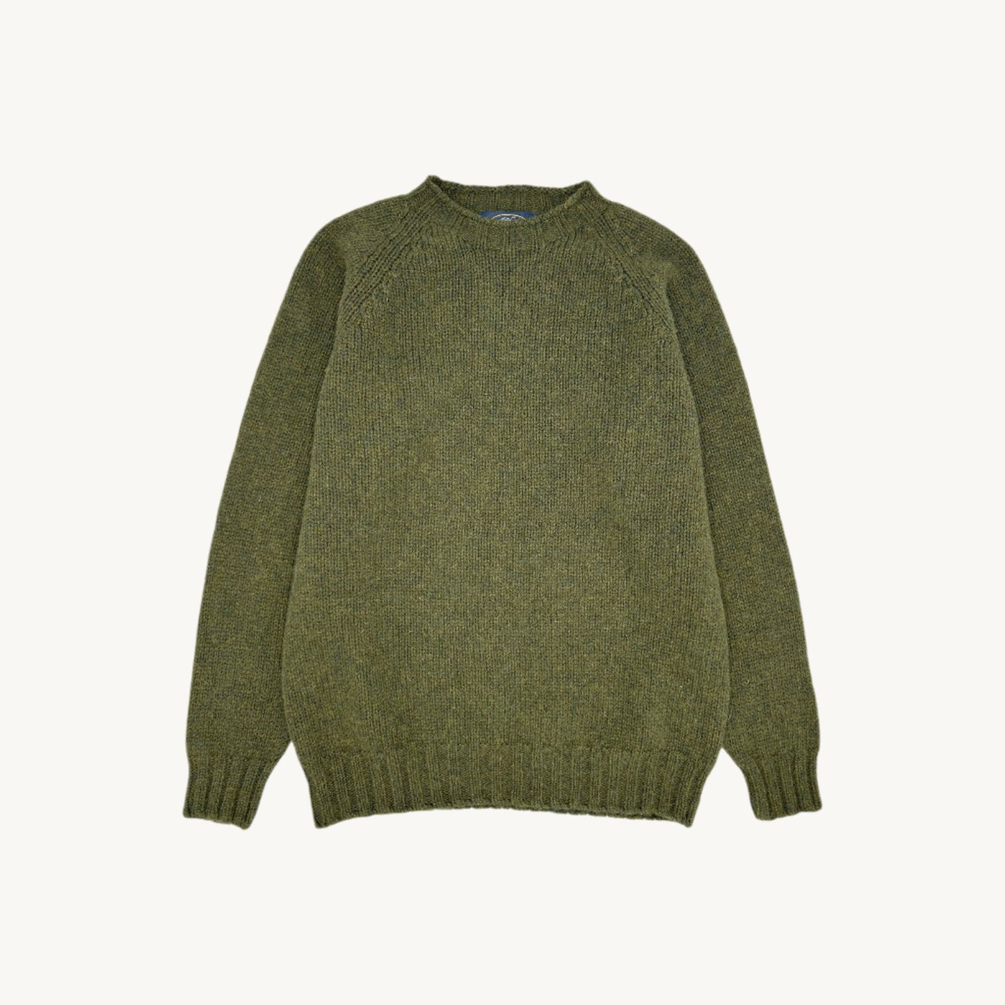 Flatbed Photograph of a Blue Mogganer North Sea Chunky Seamless Supersoft Shetland in loden green by Bosie Knitwear