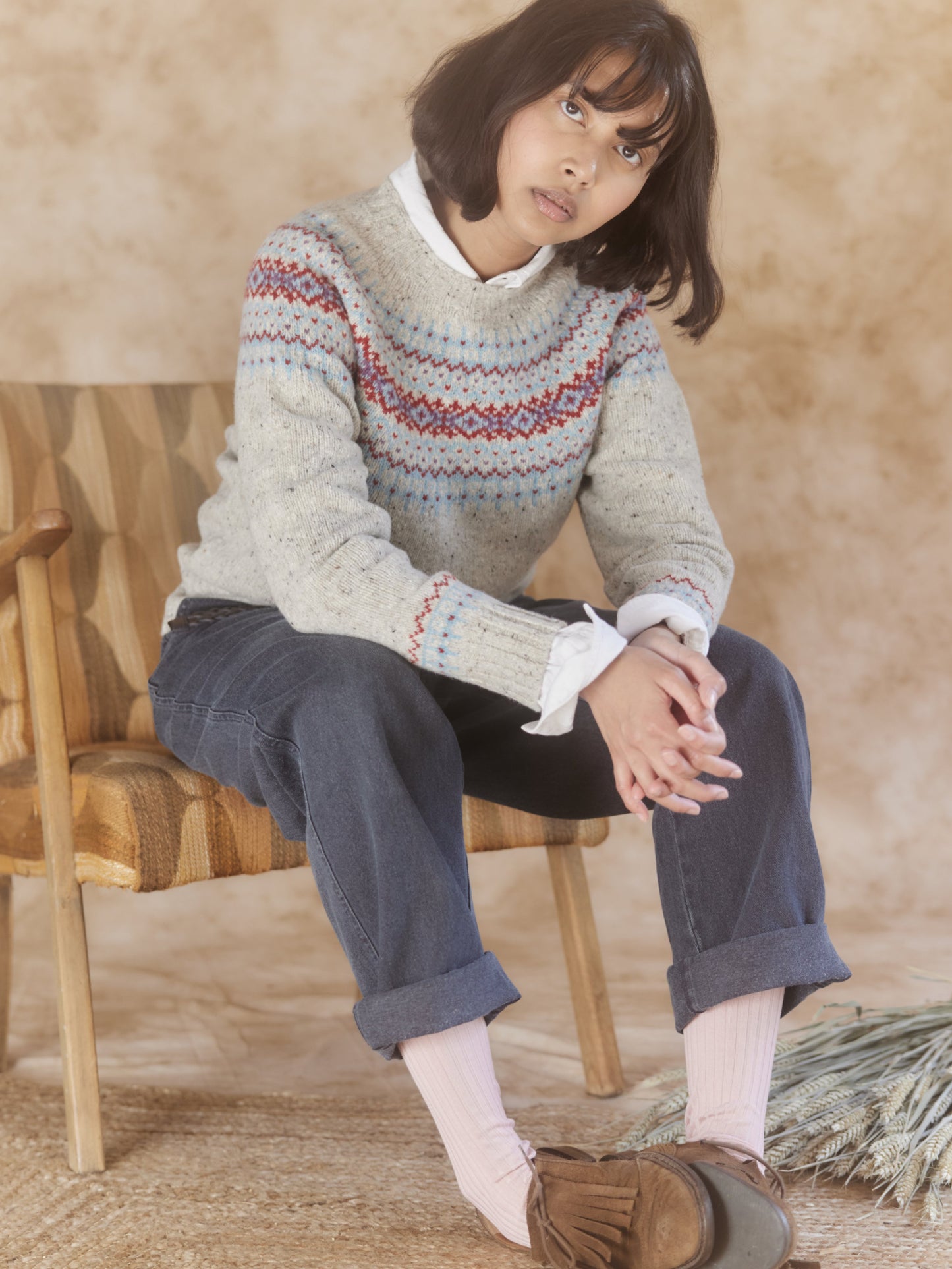 Woman wearing a Mull Natural Bosie Islander Glenugie Nep Fairisle Yoke Sweater