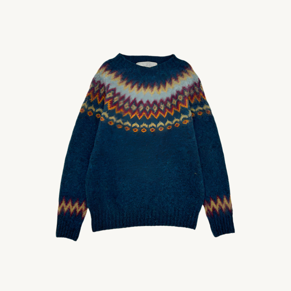 Flatbed photograph of a petrel dark teal brushed Bosie Fjord Fairisle lambswool Sweater