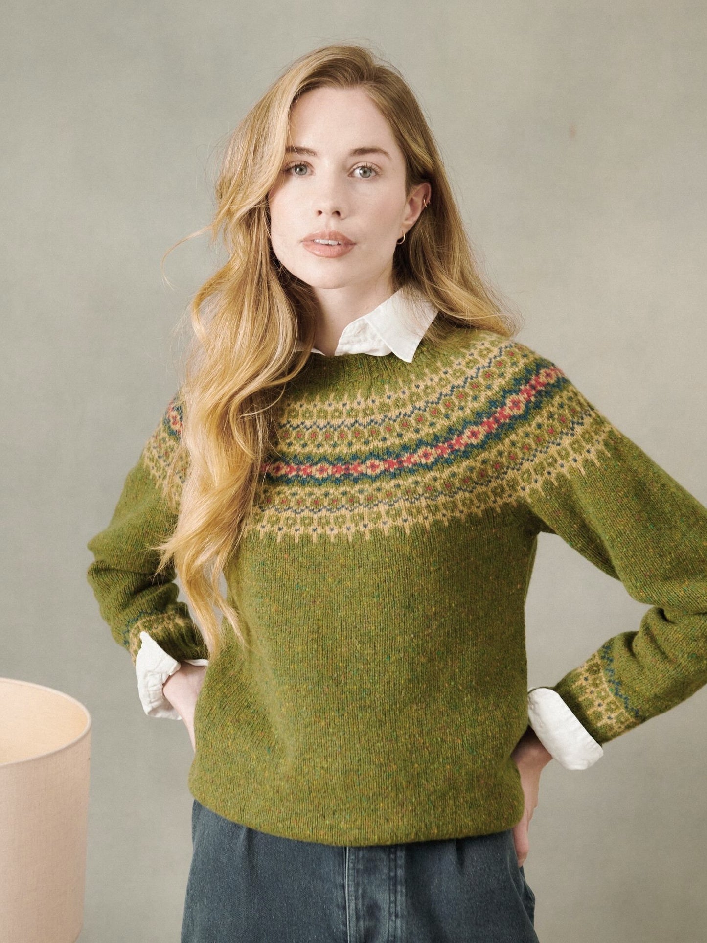 Woman wearing a Raasay Green Bosie Islander Glenugie Nep Fairisle Yoke Sweater
