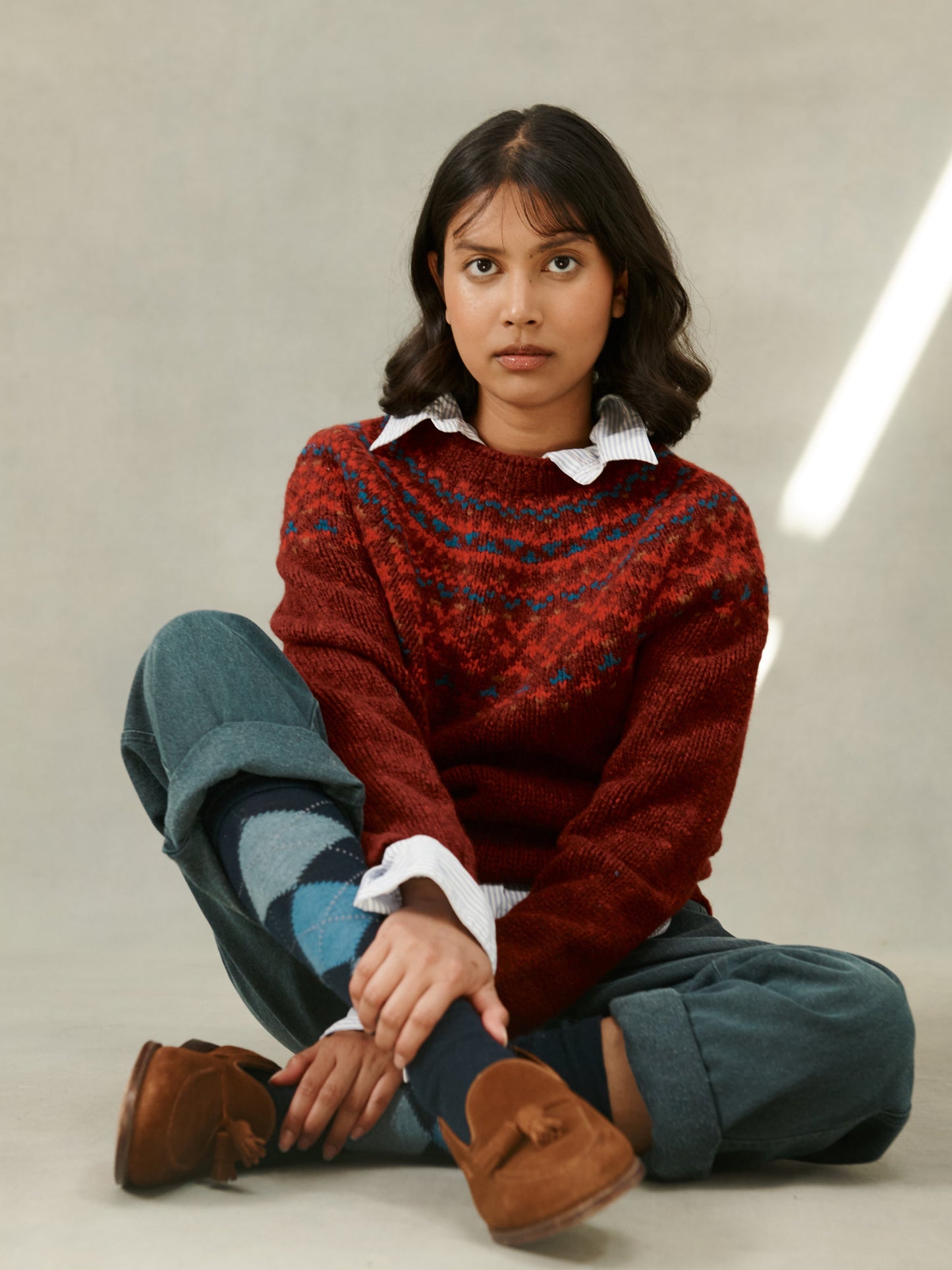 Woman wearing a Tiree Red fairisle Bosie Luskentyre chunky Glenugie Nep Fairisle Yoke Sweater