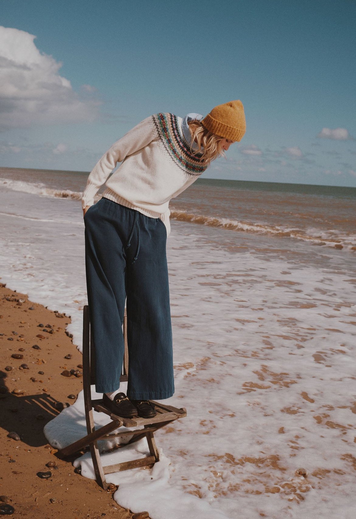 Woman in a winter white West Coast Fairisle Yoke womens lambswool seamless sweater jumper by Bosie Knitwear