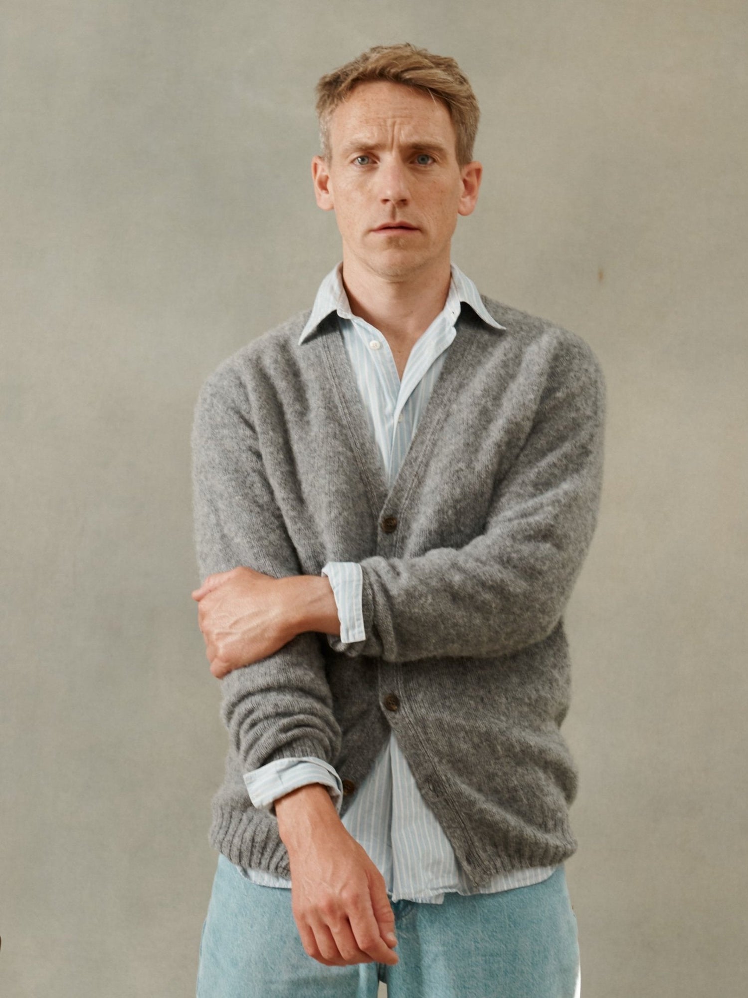 Man in a Silver Grey brushed wool  Harley of Scotland Shaggy Shetland V cardigan by Bosie Knitwear