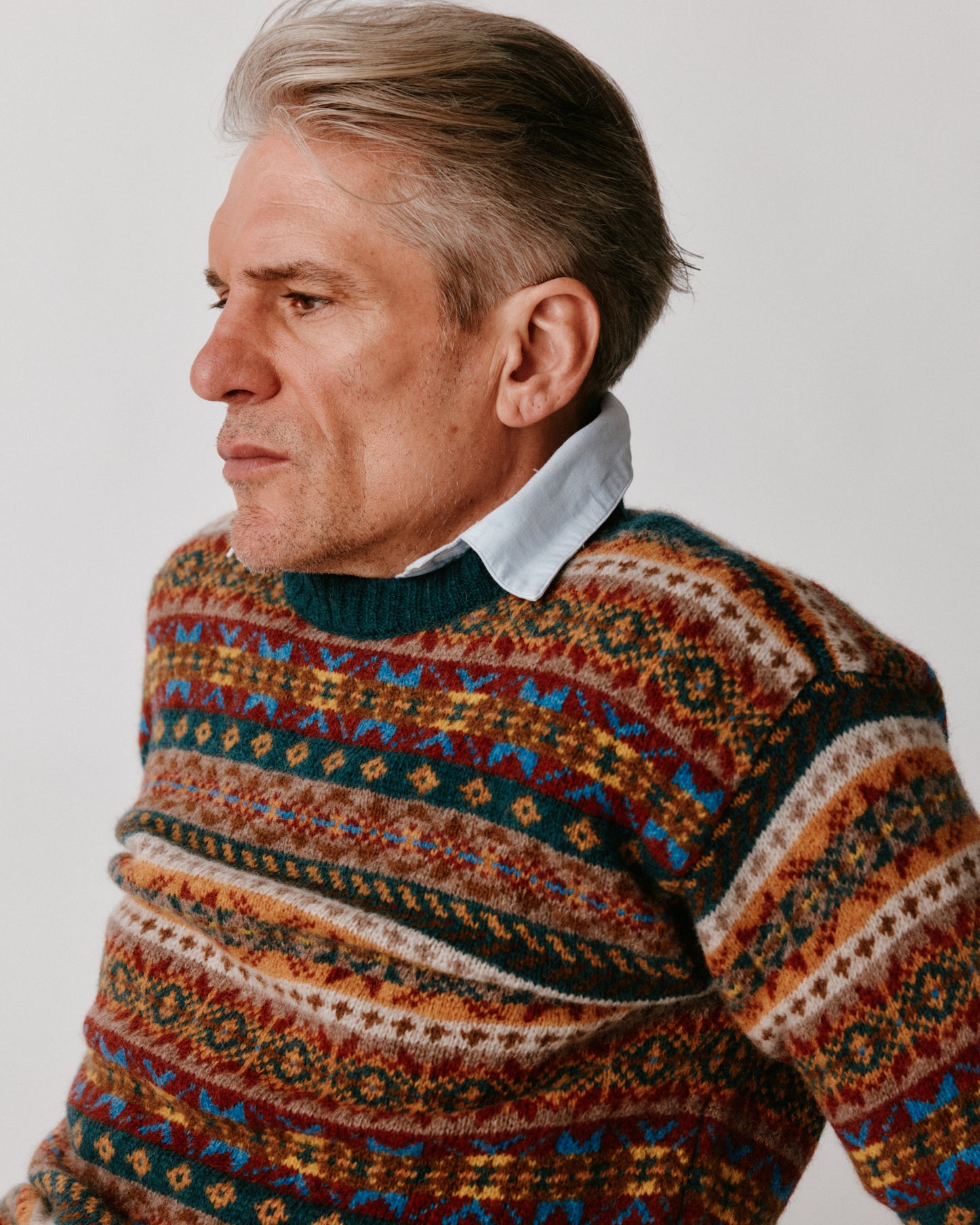 A model wearing a Bosie Blue Mogganer Crovie Fairisle in colour Tempest / Storm.