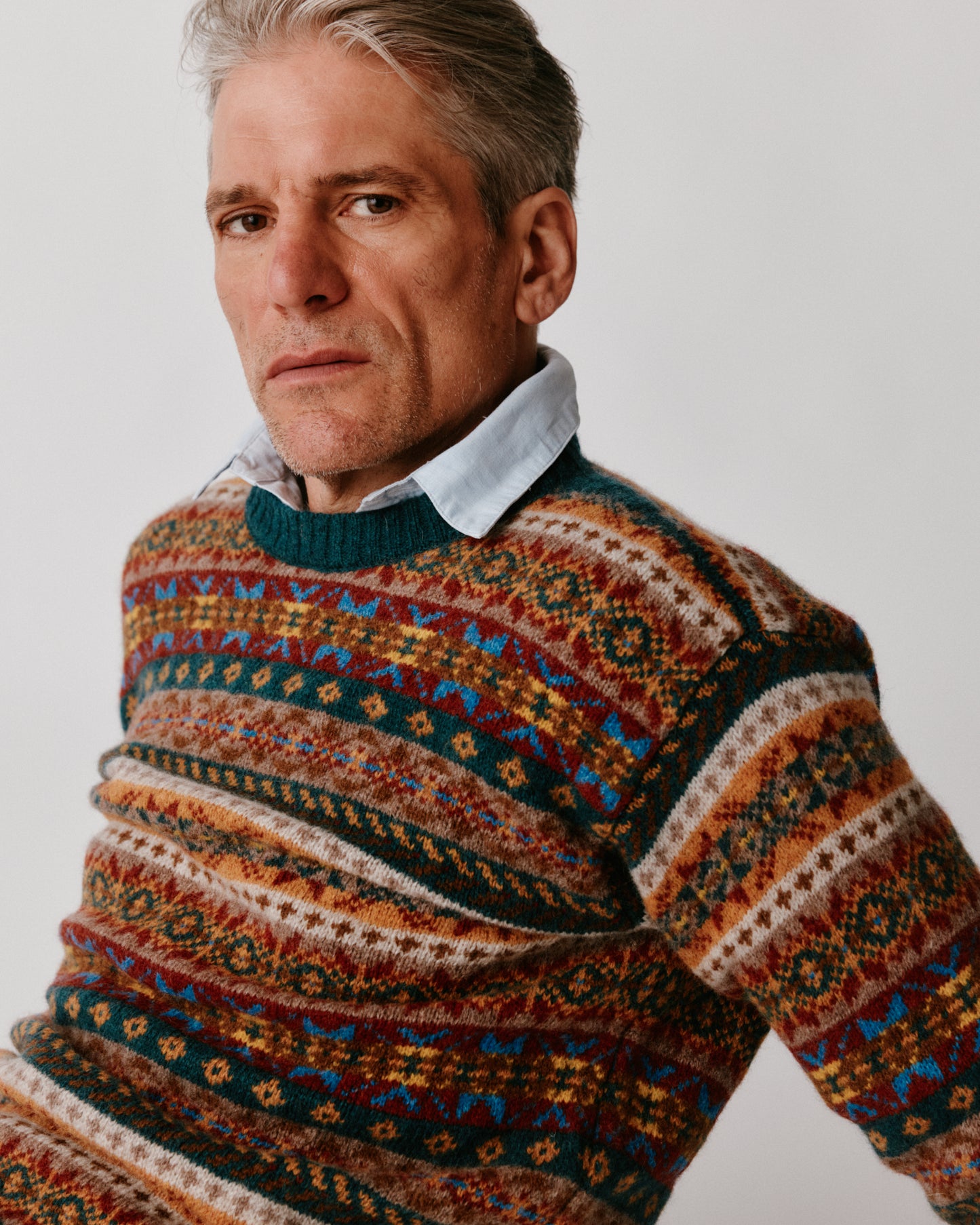 A model wearing a Bosie Blue Mogganer Crovie Fairisle in colour Tempest / Storm.