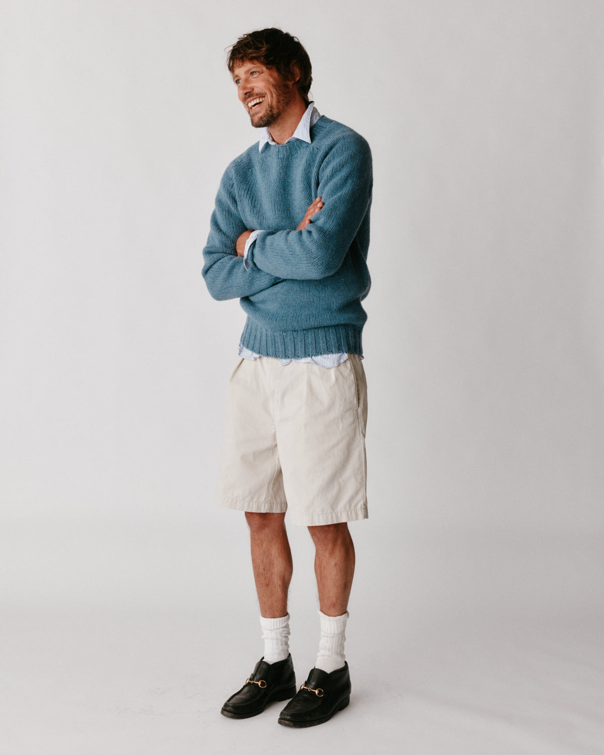 A model wearing a Bosie Blue Mogganer Explorer Extra Chunky Seamless Supersoft Shetland Sweater in colour Cirrus.
