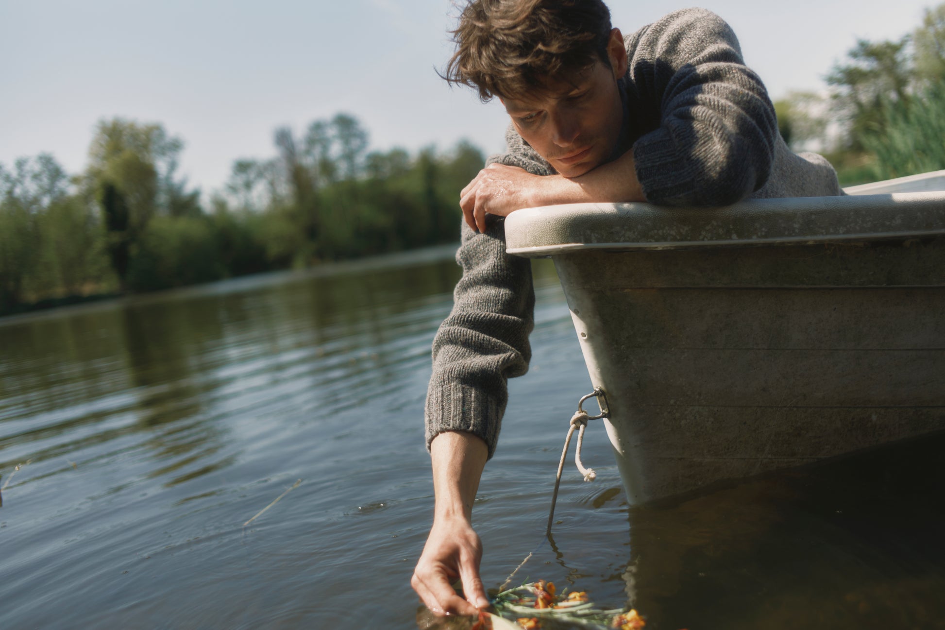 Model wearing a Bosie Knitwear Blue Mogganer Glenugie Nep Funnel Neck Lighthouse Sweater  in colour St Kilda Grey.