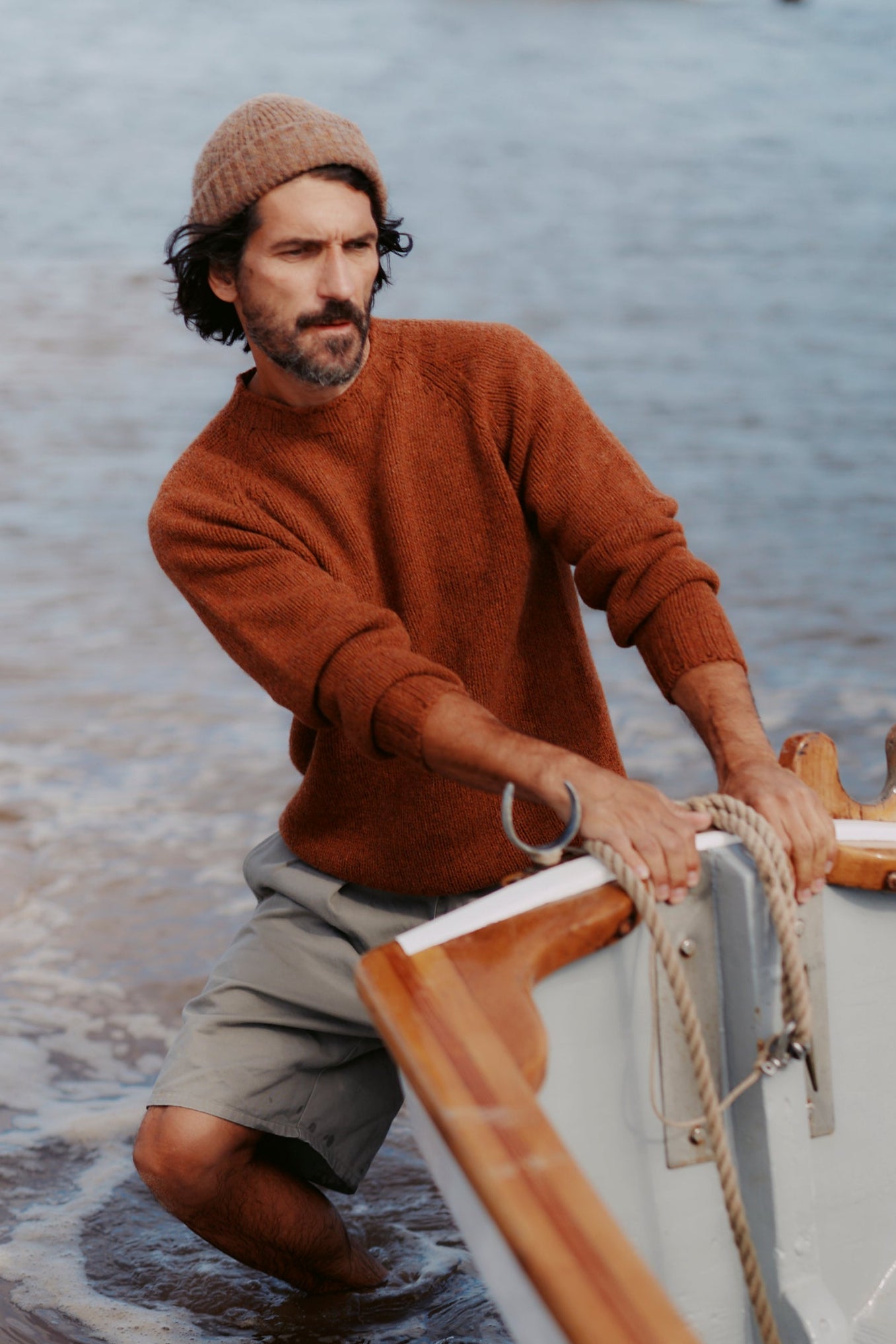 Man wearing a Bosie Knitwear Blue Mogganer North Sea Chunky Seamless Supersoft Shetland Sweater in colour Sienna Brown.