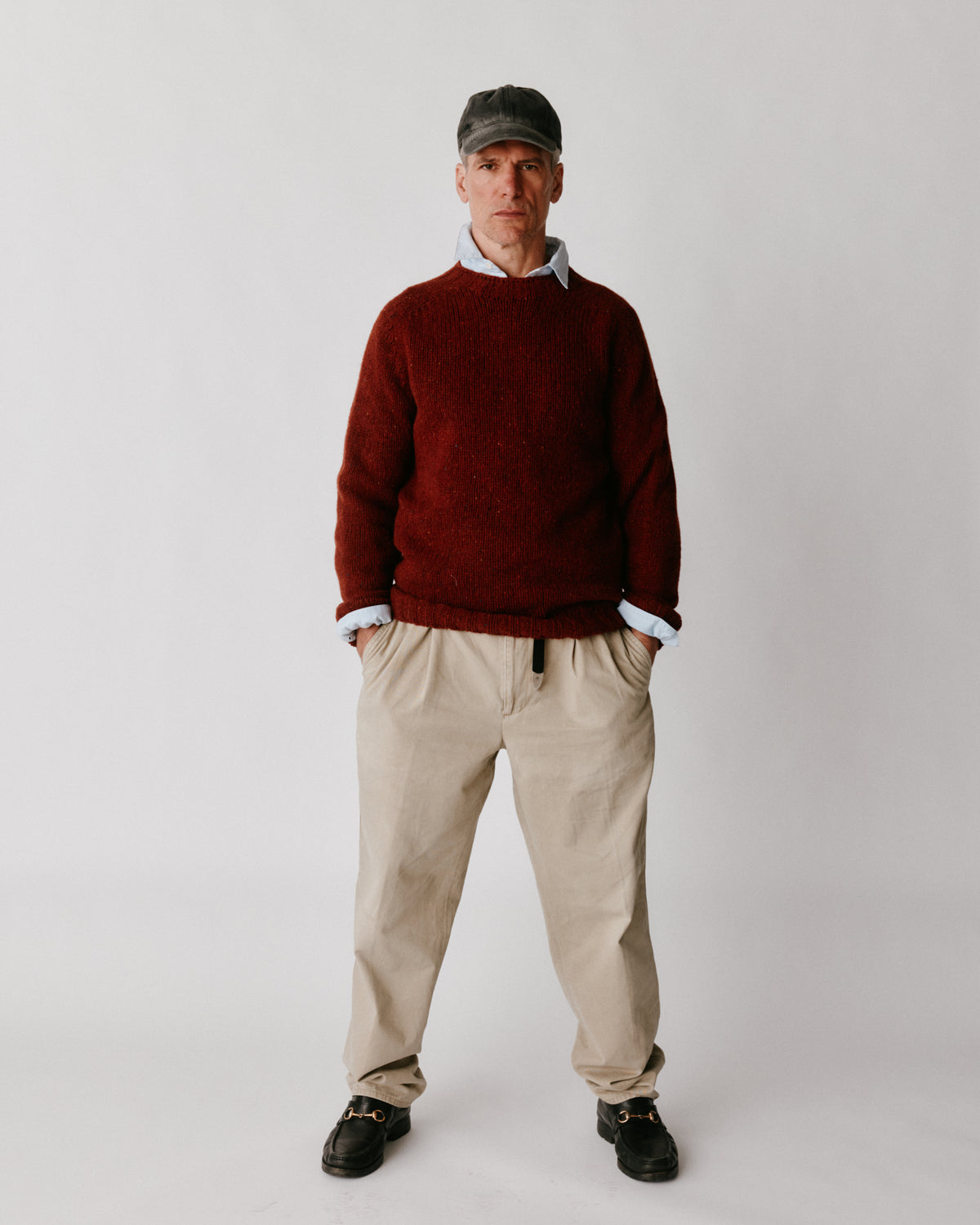 A model wearing a Bosie Blue Mogganer Trawlerman Chunky Glenugie Nep Sweater in colour Hoy.