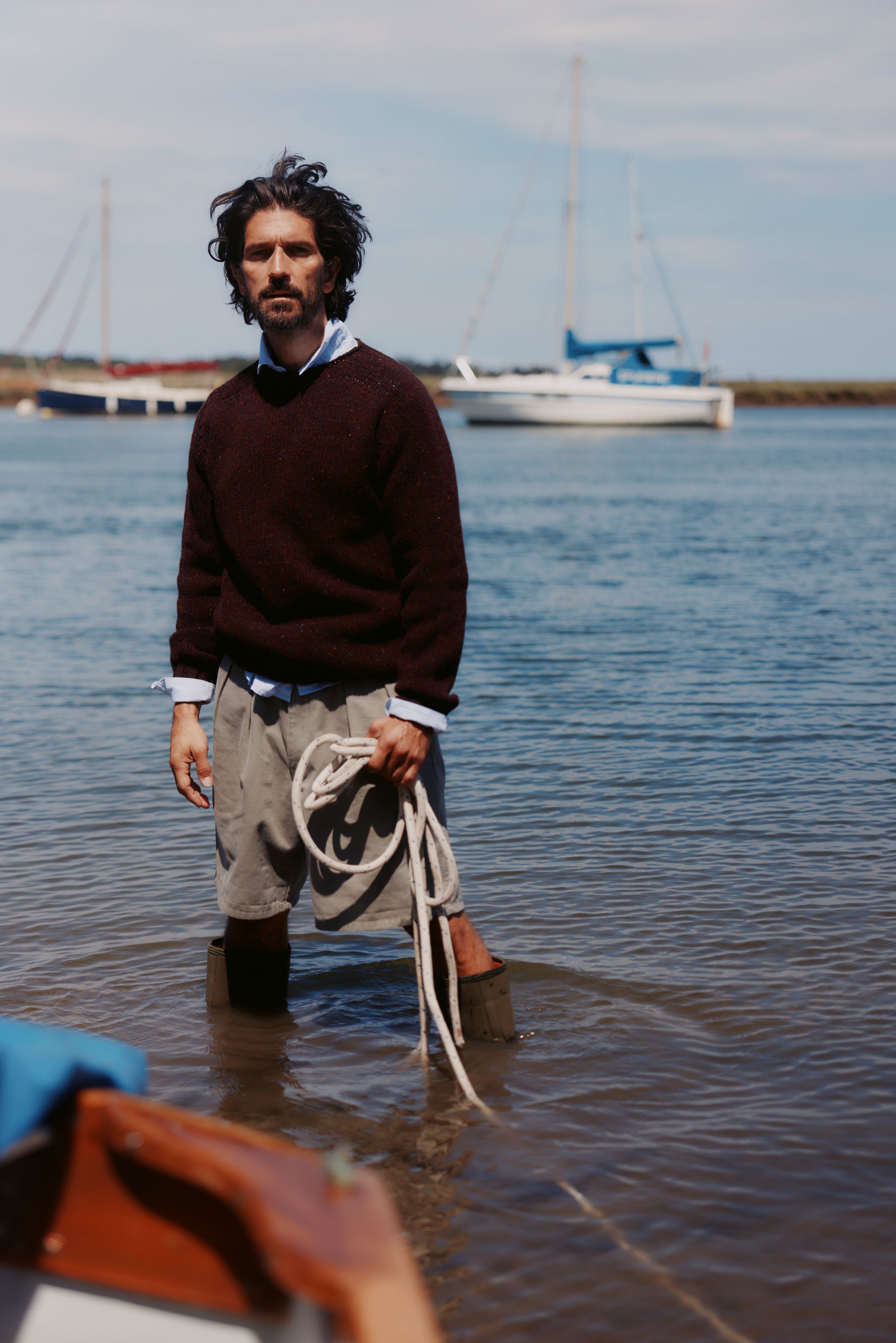 Model wearing a Bosie Knitwear Blue Mogganer Trawlerman Chunky Glenugie Nep Sweater in colour Lewis Dark Aubergine.