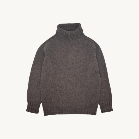 Flatbed photograph of a Bosie Knitwear Blue Mogganer Womens Siren Merino Polo Neck Sweater in colour Porcupine Brown. 