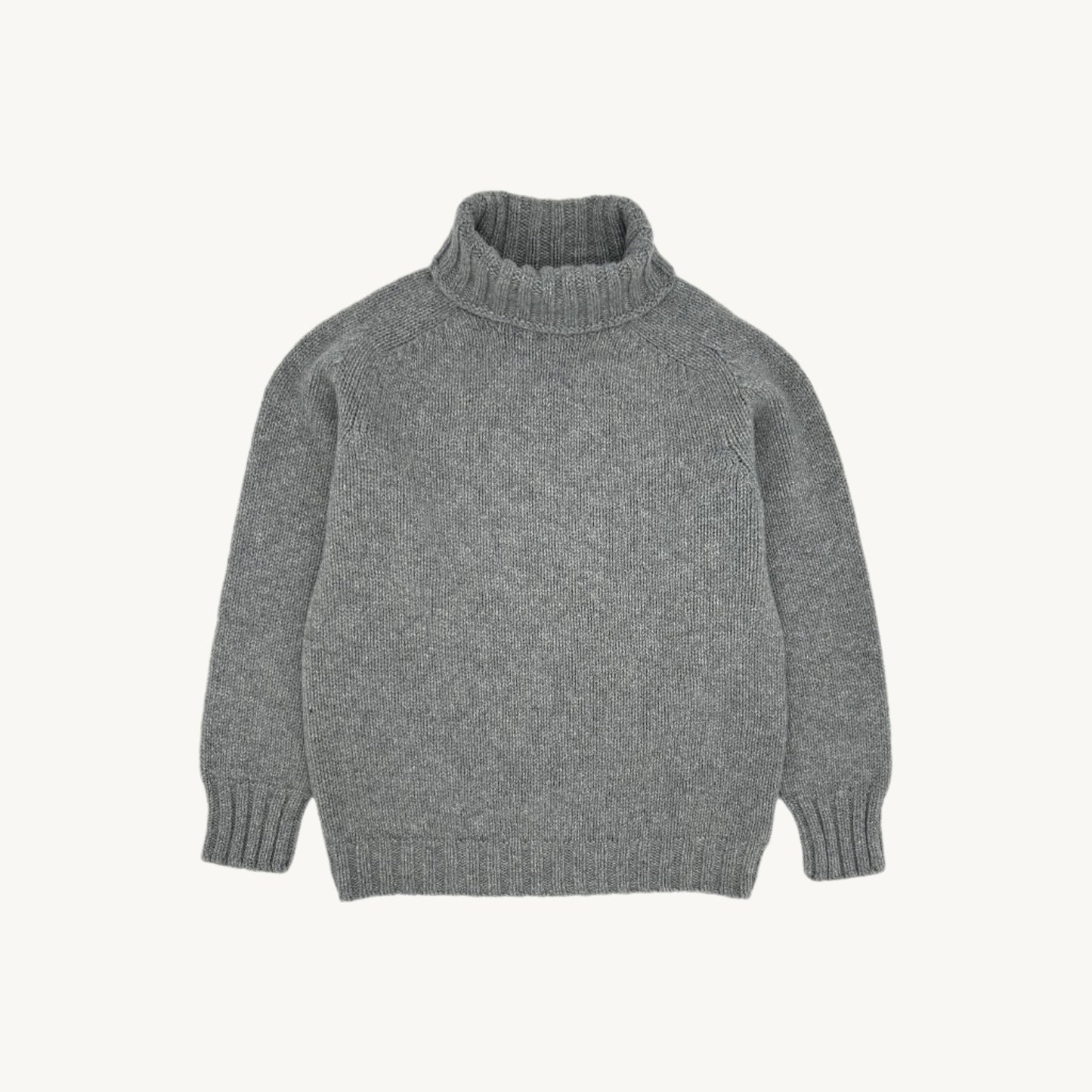 Flatbed photograph of a Bosie Knitwear Blue Mogganer Womens Siren Merino Polo Neck Sweater in colour Flannel Grey.