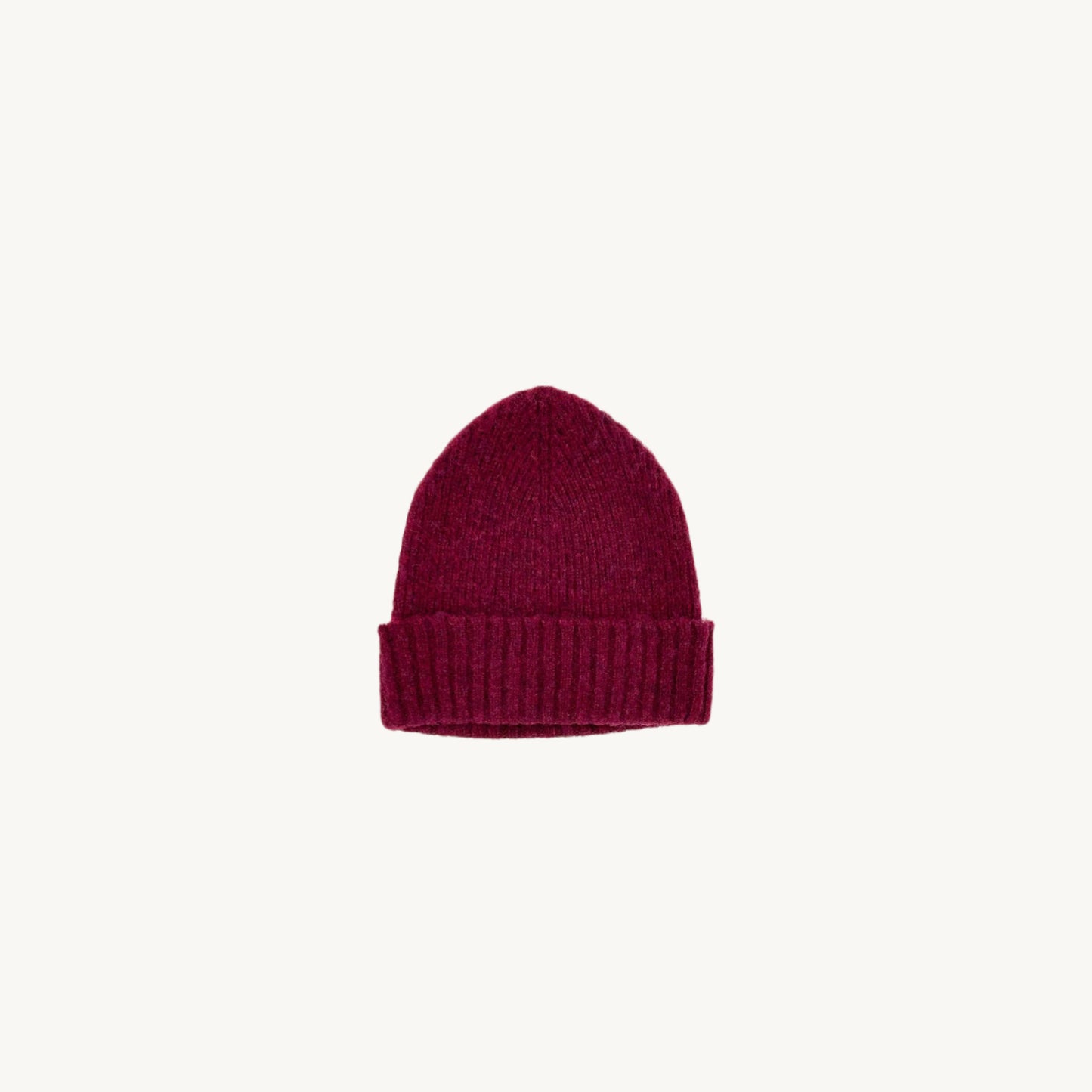 Flatbed photograph of a Bosie Brushed Shetland Wool Beanie Hat in colour Claret / Bordeaux MIx.