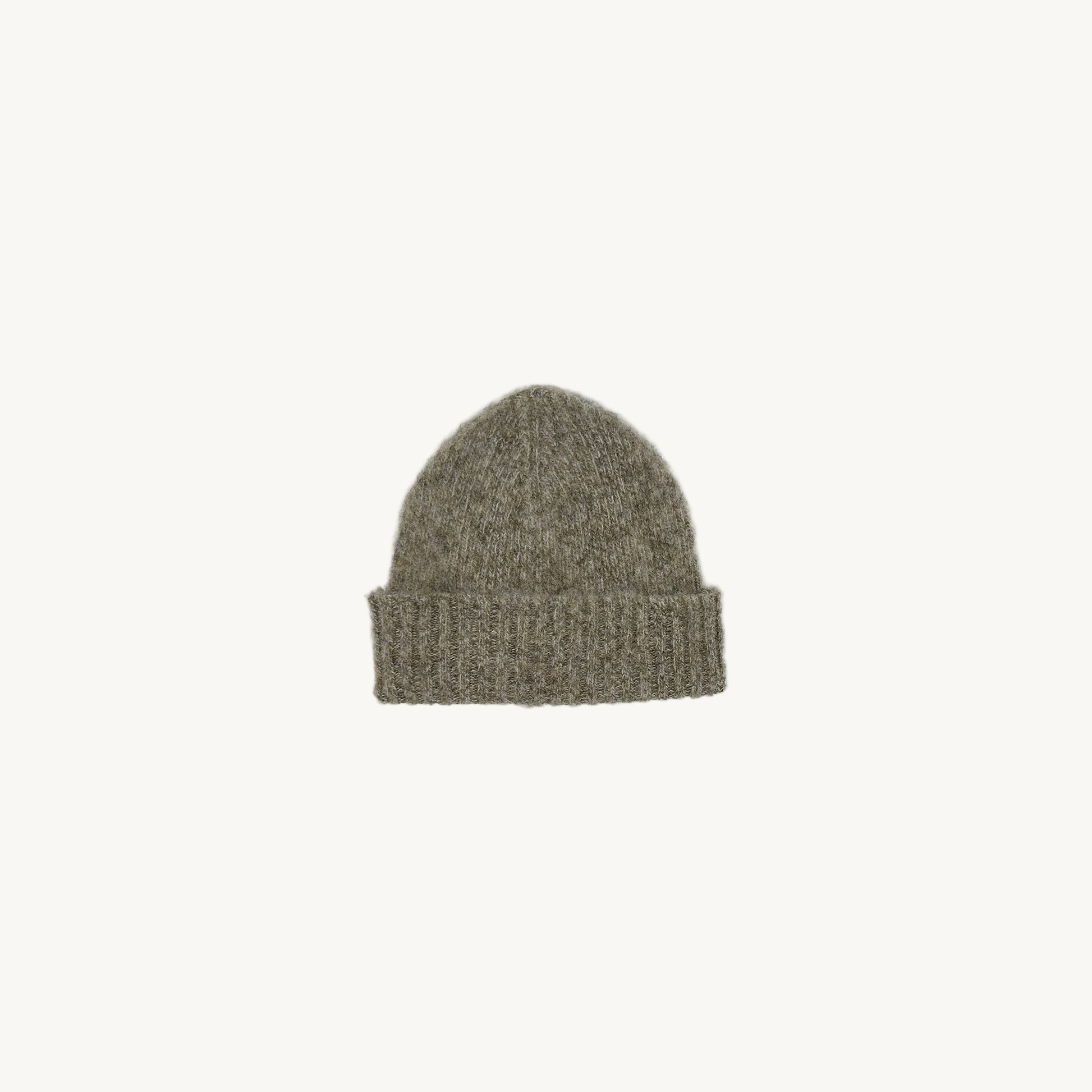Flat bed photograph of a Bosie Brushed Shetland Wool Beanie Hat in colour Mushroom Brown.