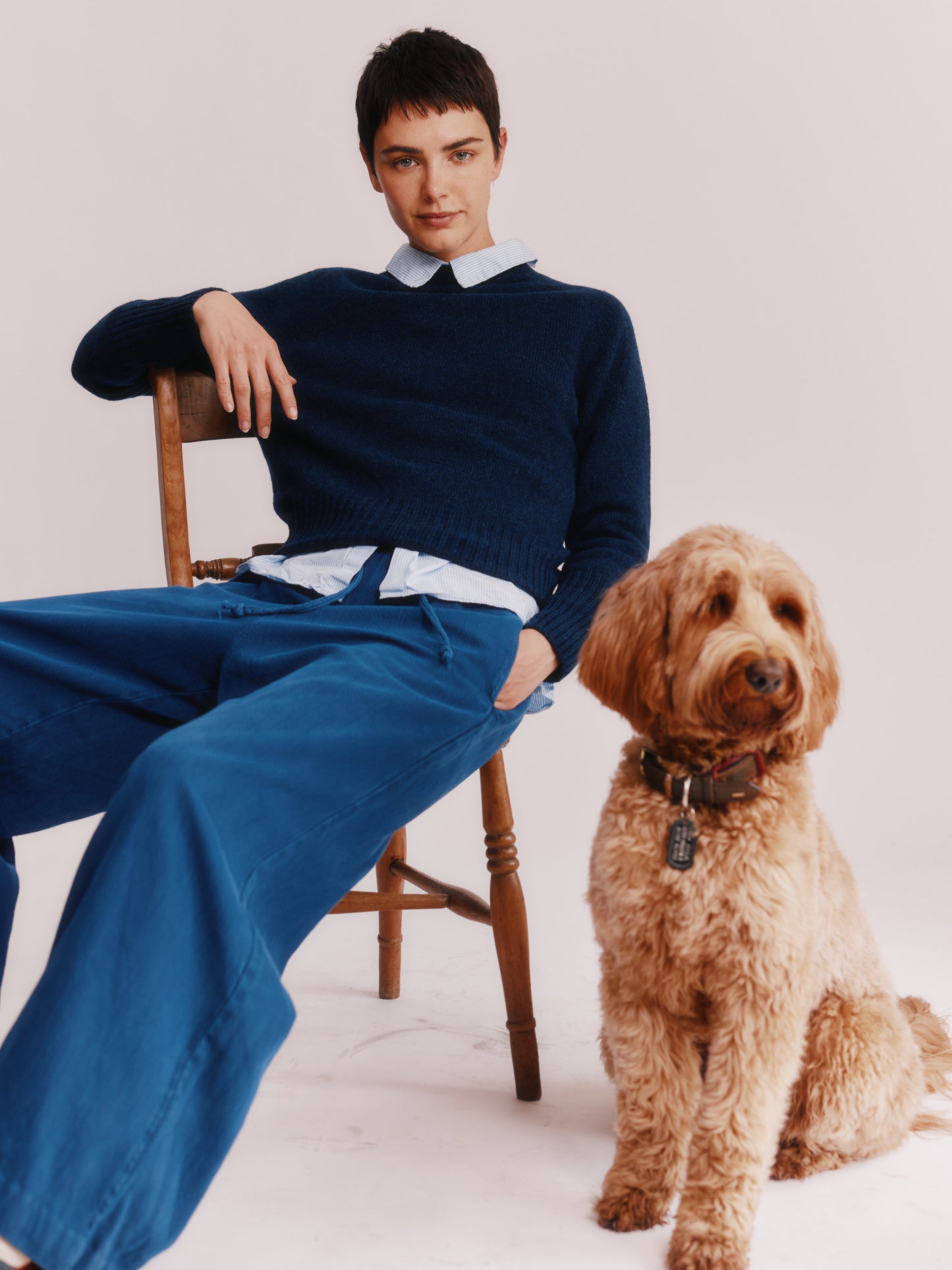 Model wearing a Bosie Knitwear  Geelong 2ply Crew Neck Womens Jumper in colour Cosmos Navy.