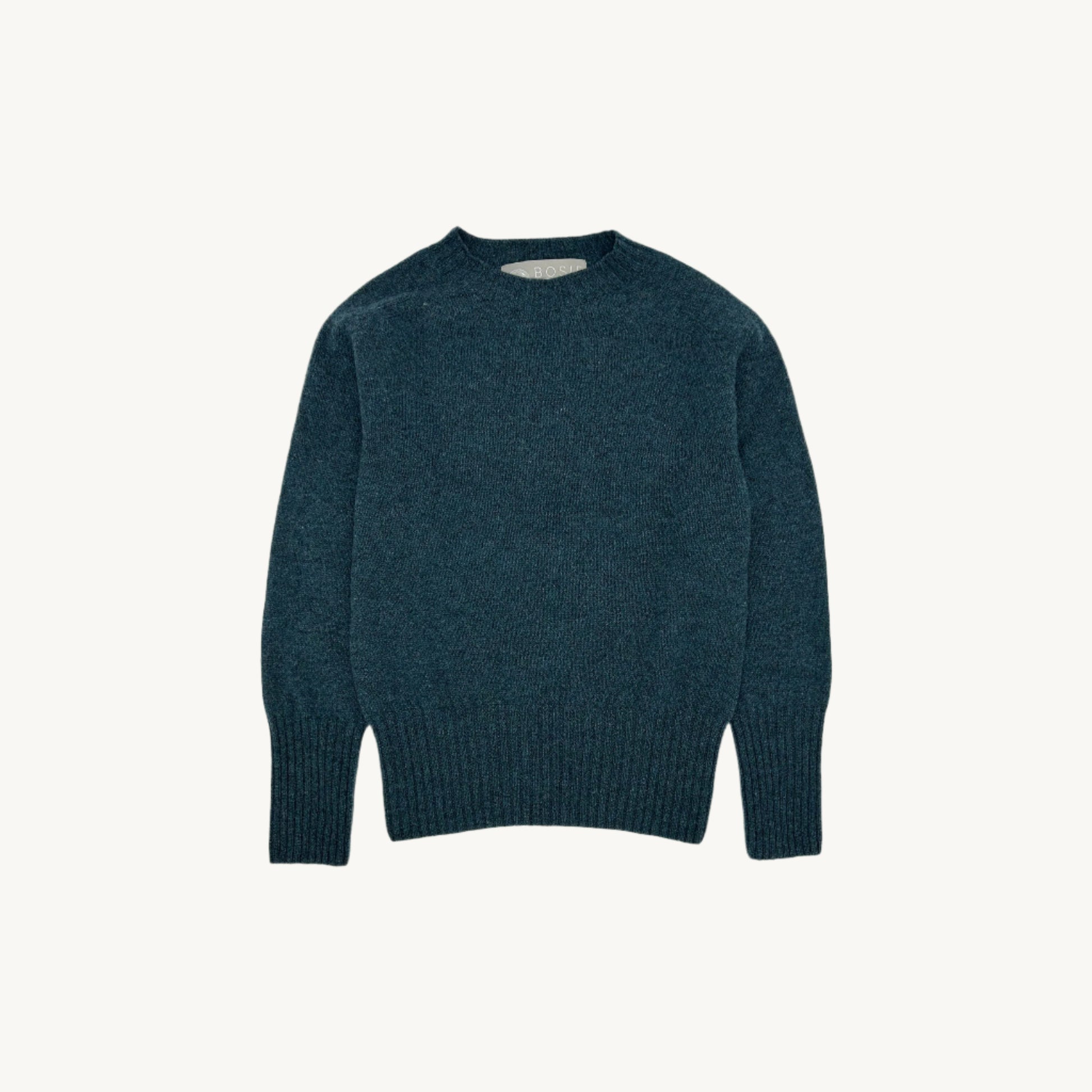 Flatbed photograph of a Bosie Knitwear Geelong 2ply Crew Neck Womens Jumper in colour Lugano Dark Teal.