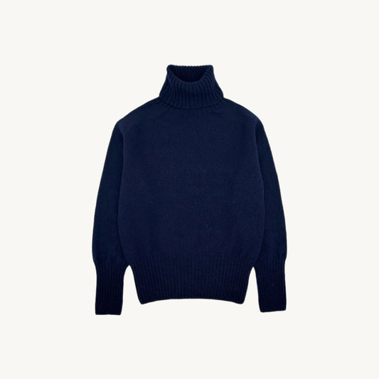 Flatbed photograph of a Bosie Geelong Polo Neck Womens Jumper in colour Navy.