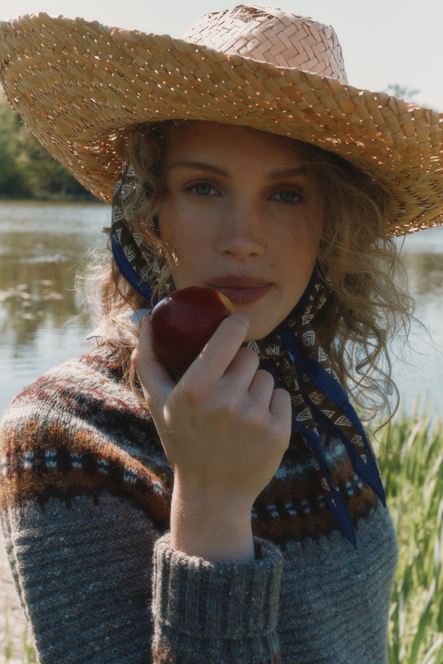 Model wearing a Bosie Knitwear Cottage Fair Isle Glenugie Nep Women's Sweater in colour Torridon Grey.